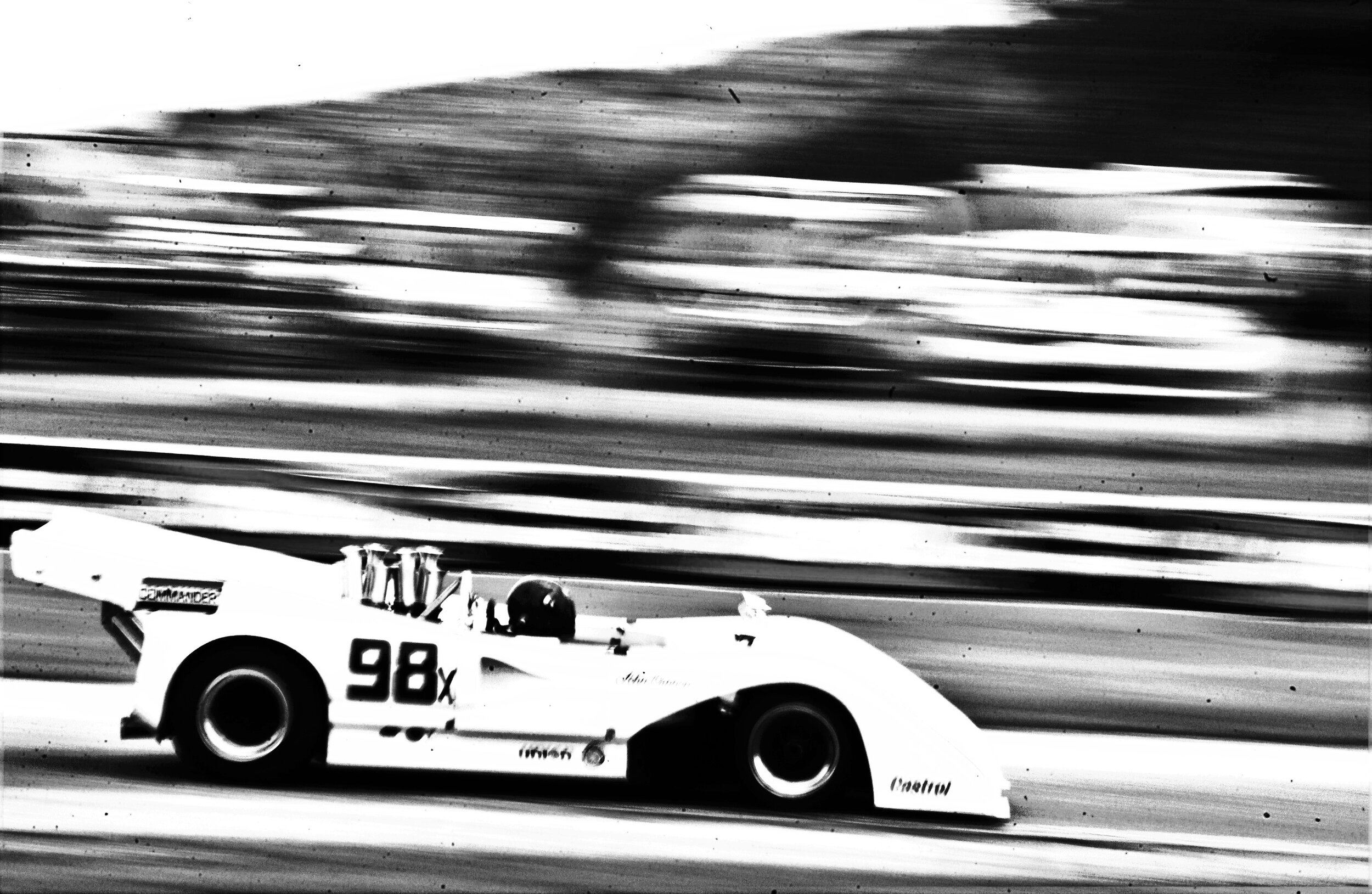  McLaren Can Am race car at speed at Road America. 