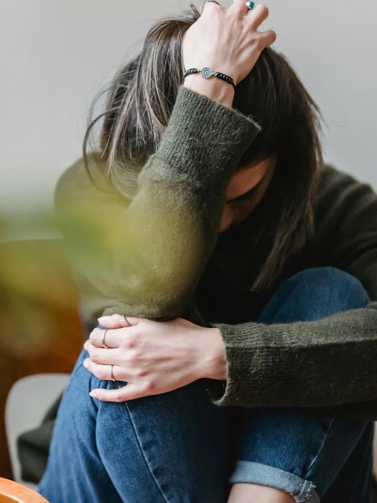 Woman in psychotherapy to treat CPTSD, in person in Toronto and Vaughan, and online across Ontario using approaches like AEDP, EMDR, IFS, and CBT.