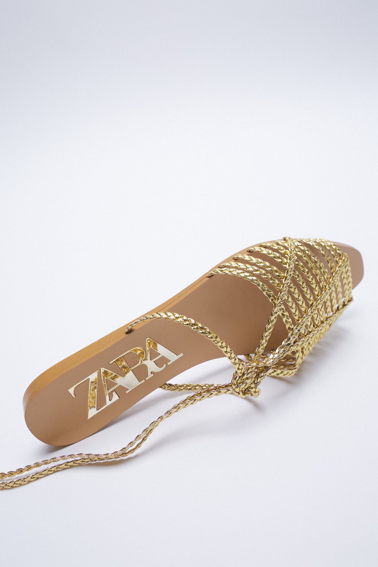 Zara woven flat sandal.jpg