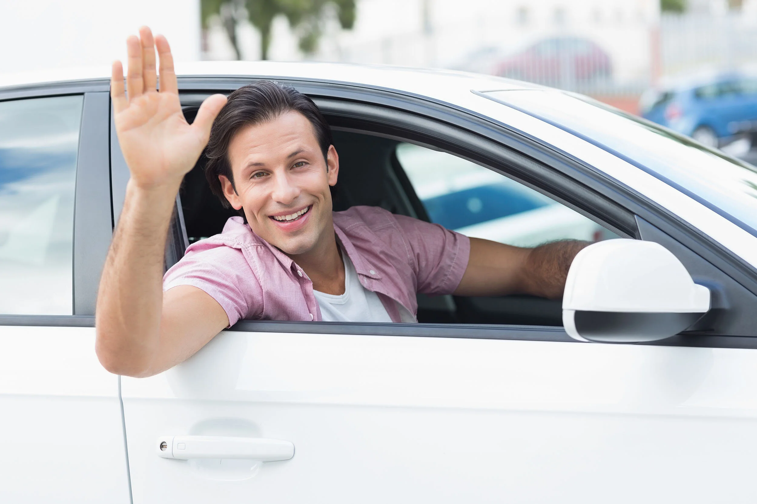 man_waving_car.jpg
