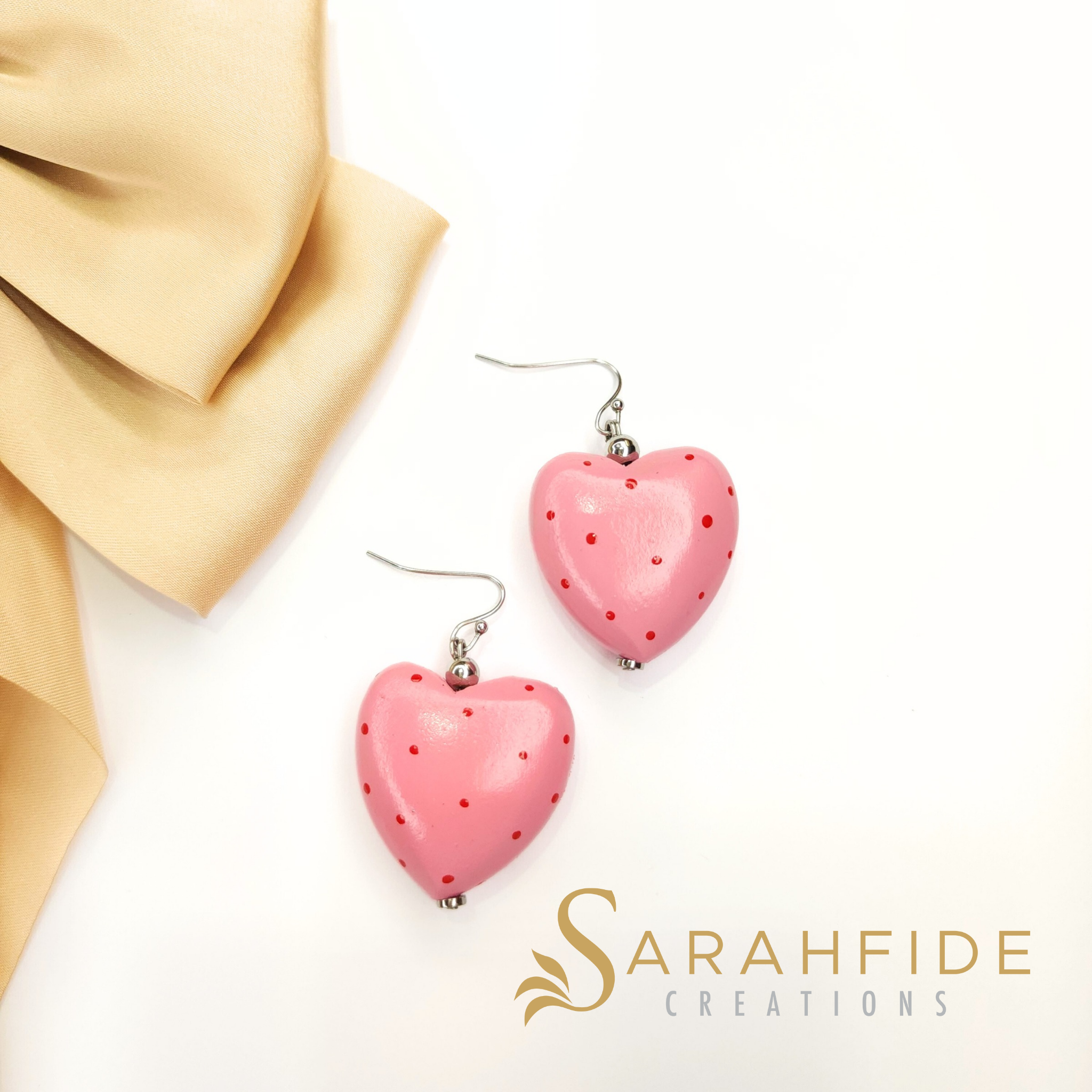 Elle Wood Chunky Heart Dangle Earrings in Pink with Red Dots