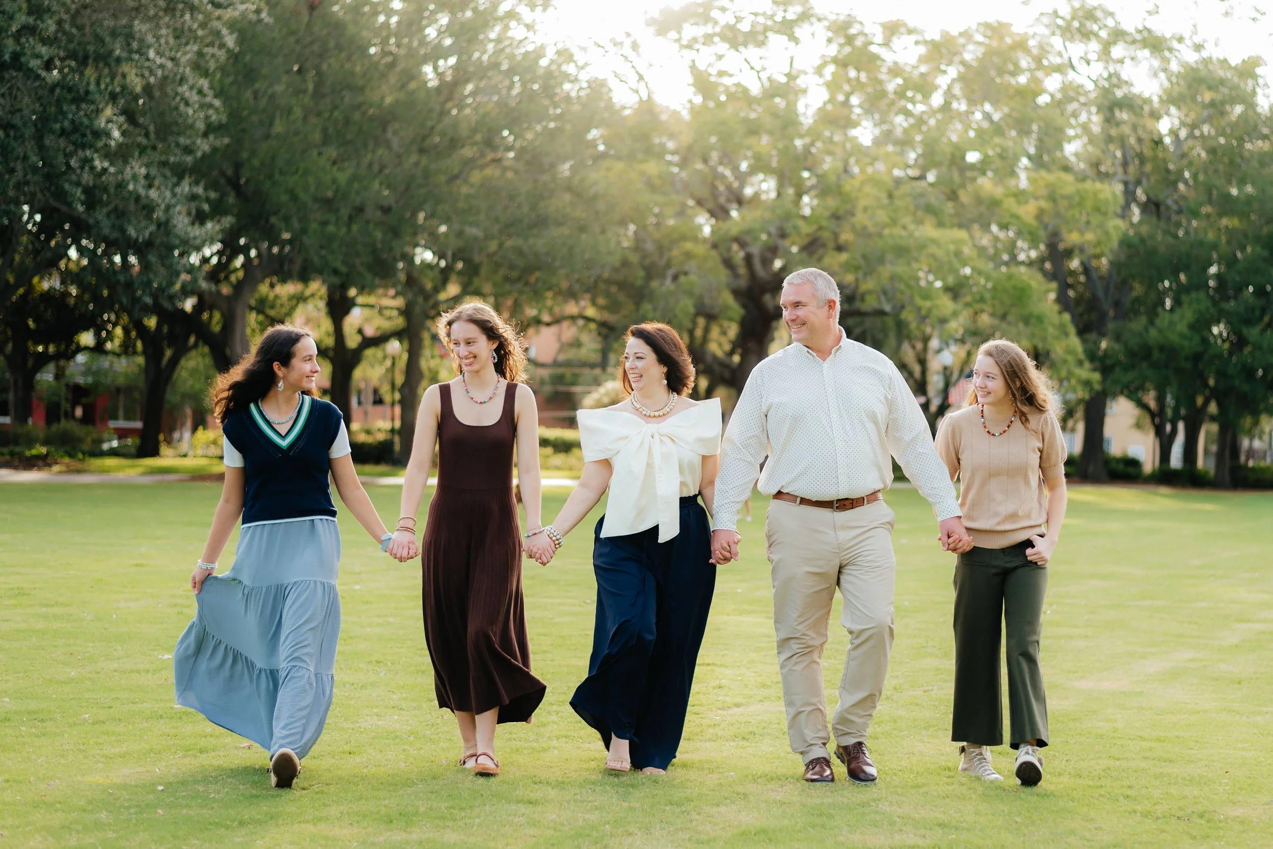 Sarah Cash and her family, the makers behind Sarahfide Creations hand-painted wood bead jewelry