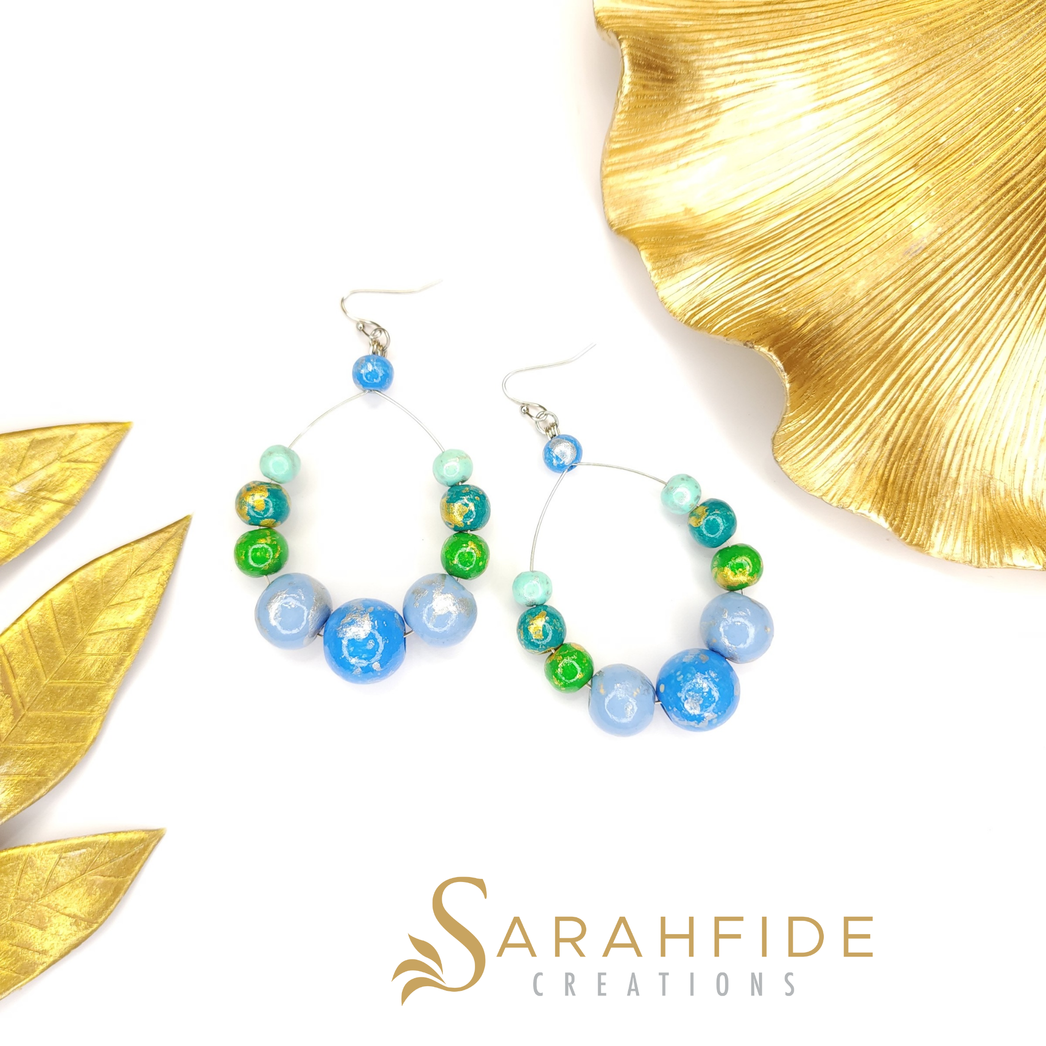 Pair of Blue Color Pop Large Round Drop Earrings laid flat