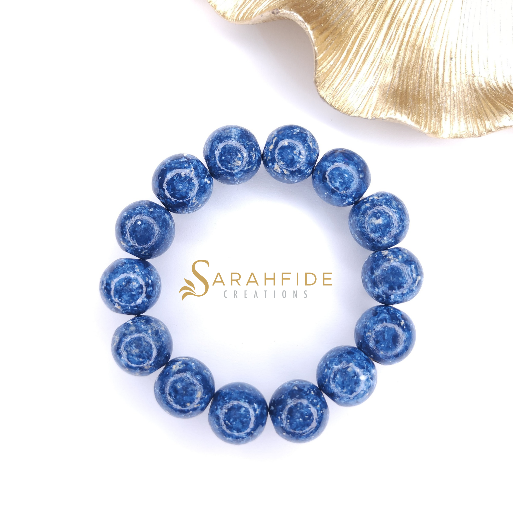 Denim Ritzy Bracelet, 16mm hand-painted blue wood beads with a gold leaf