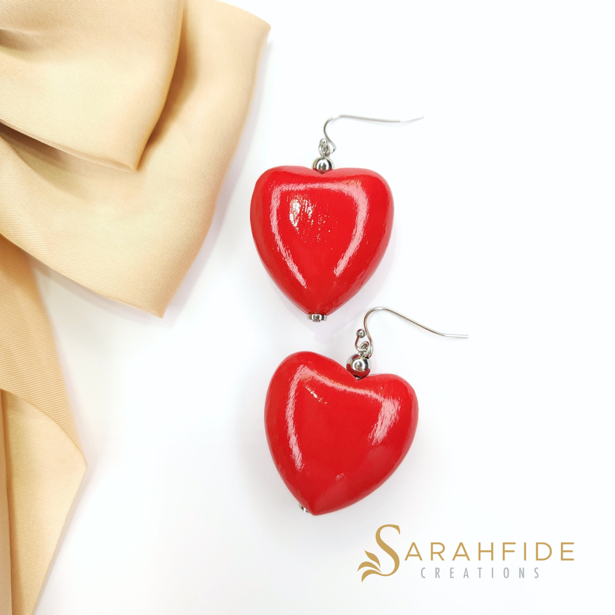 Elle Wood Chunky Heart Dangle Earrings in Red