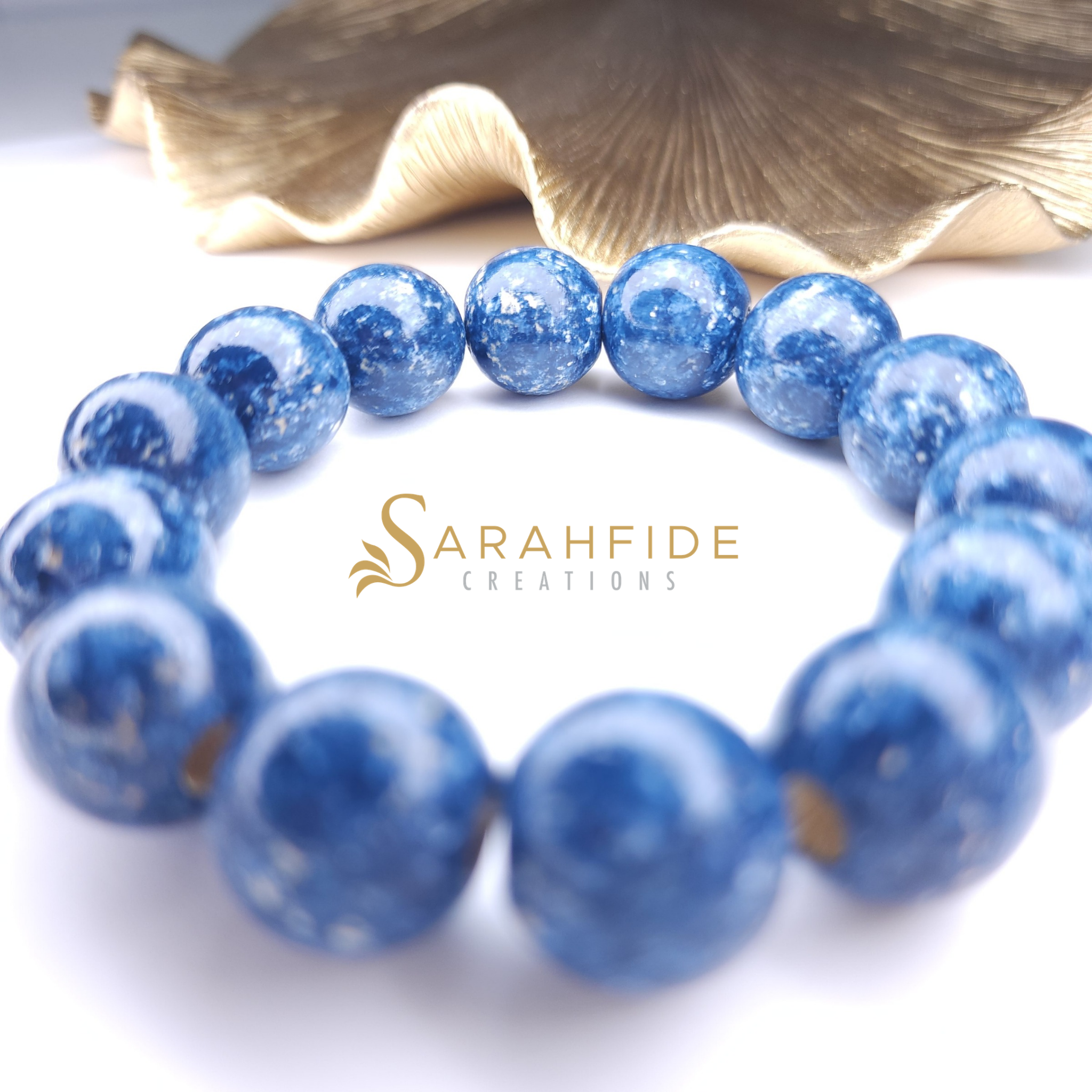 Close-up of Denim Ritzy Bracelet 16mm beads in many shades of blue