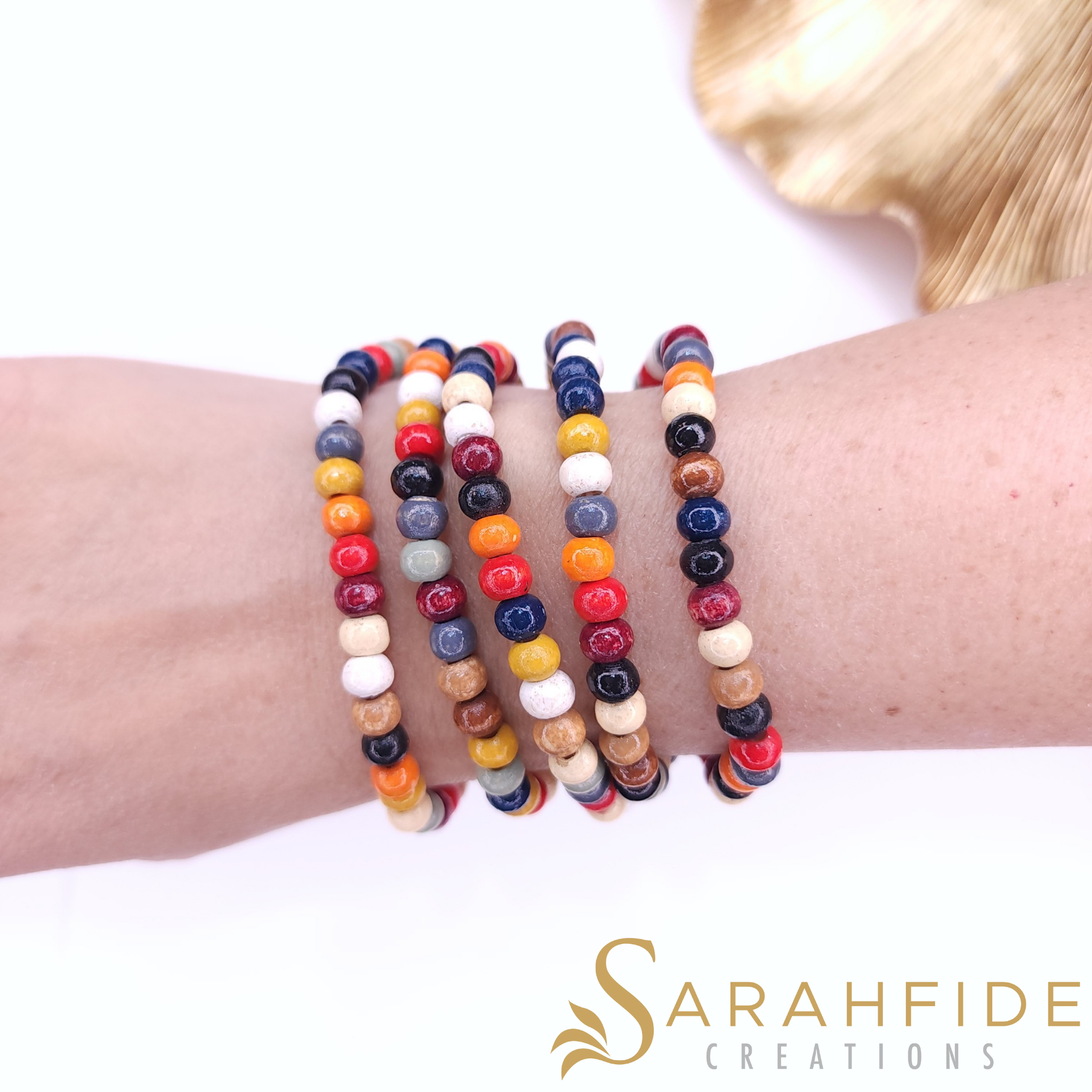 Colorful Blessings Vera 3-in-1 worn as stacked bracelets, hand-painted wood beads
