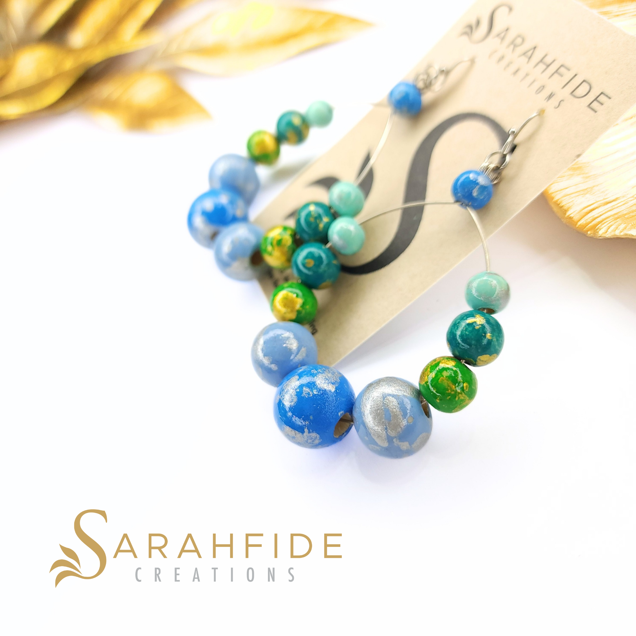Blue Color Pop Large Round Drop Earrings, hand-painted blue, teal and green wood beads with gold leaves