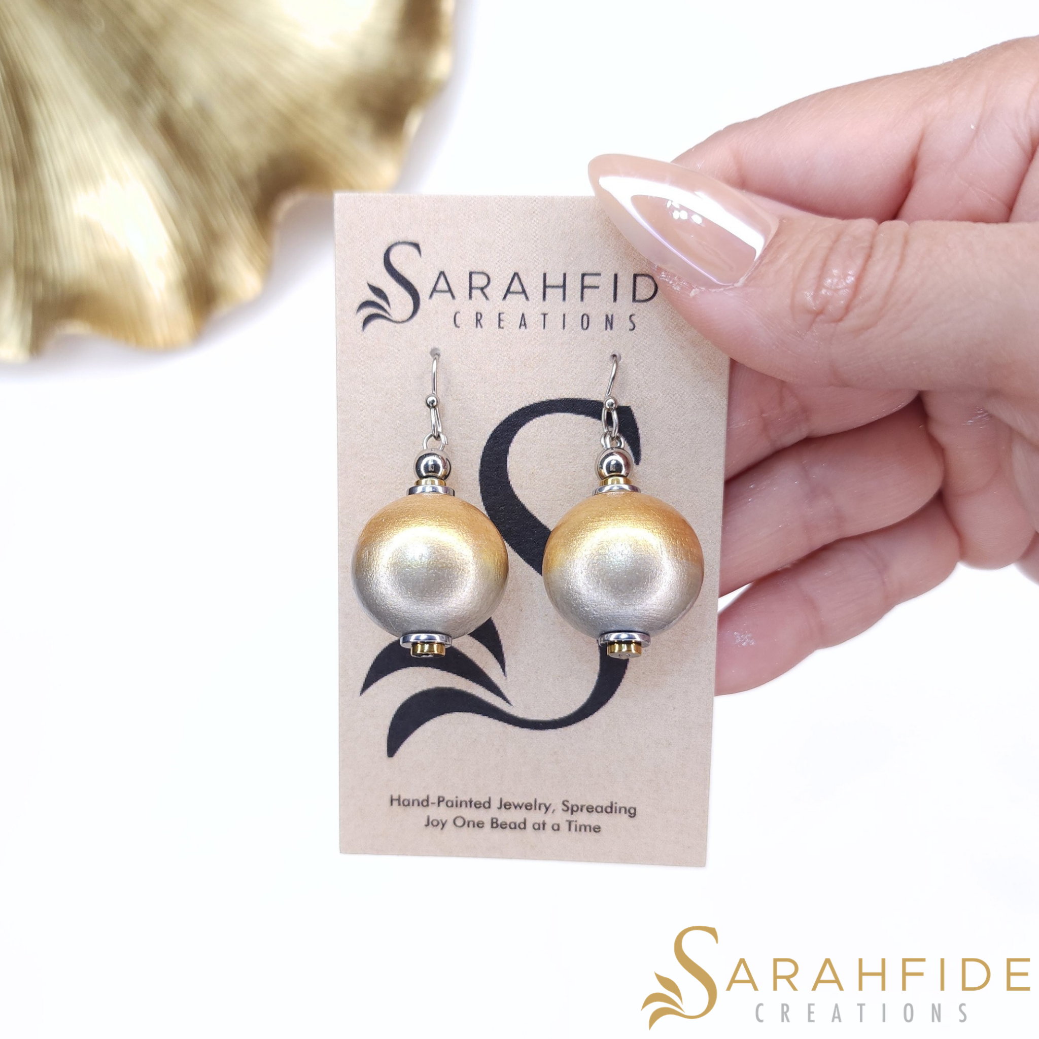 Platinum Bougie Shy Dangle Earrings on a Sarahfide earring card