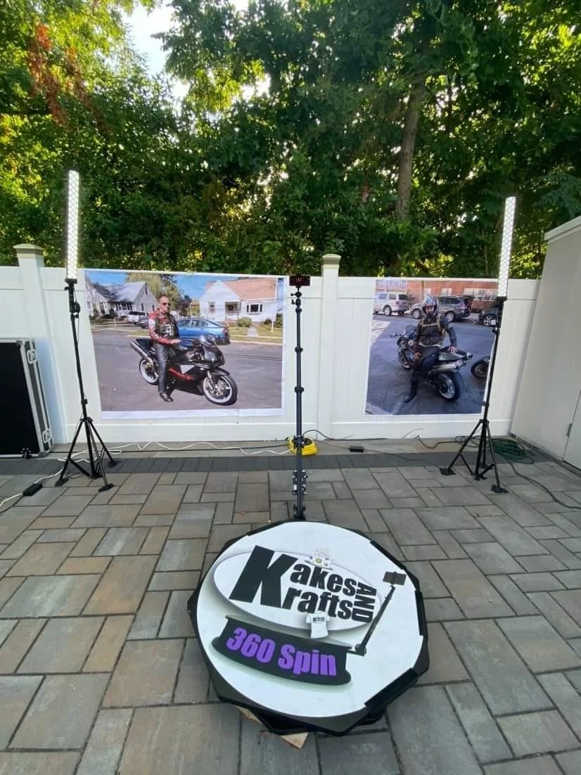 An outdoor 360 video booth platform with camera arm and lighting