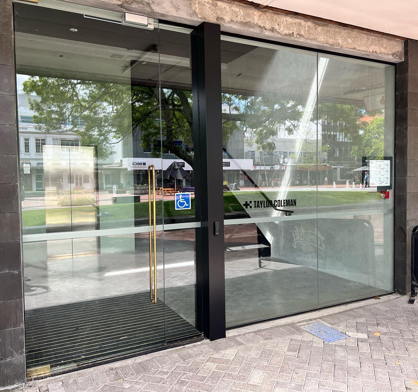 Custom frameless shop front 15mm clear toughened heavy duty floor springs 🦾