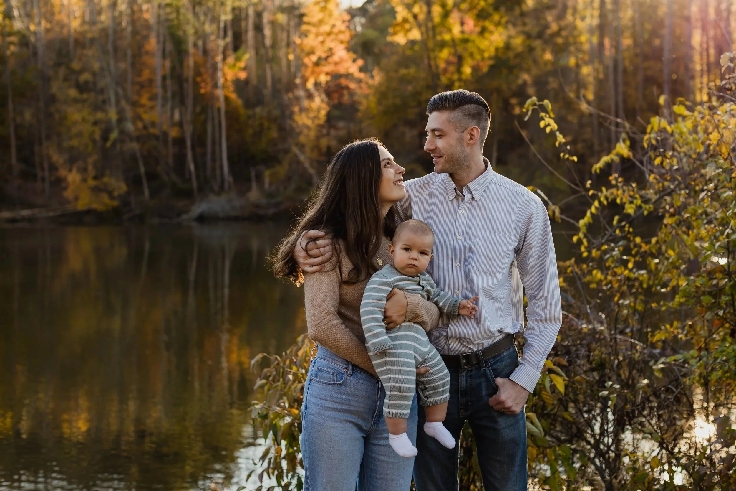 family embrace during golden hour in a park in pittsburgh, pa