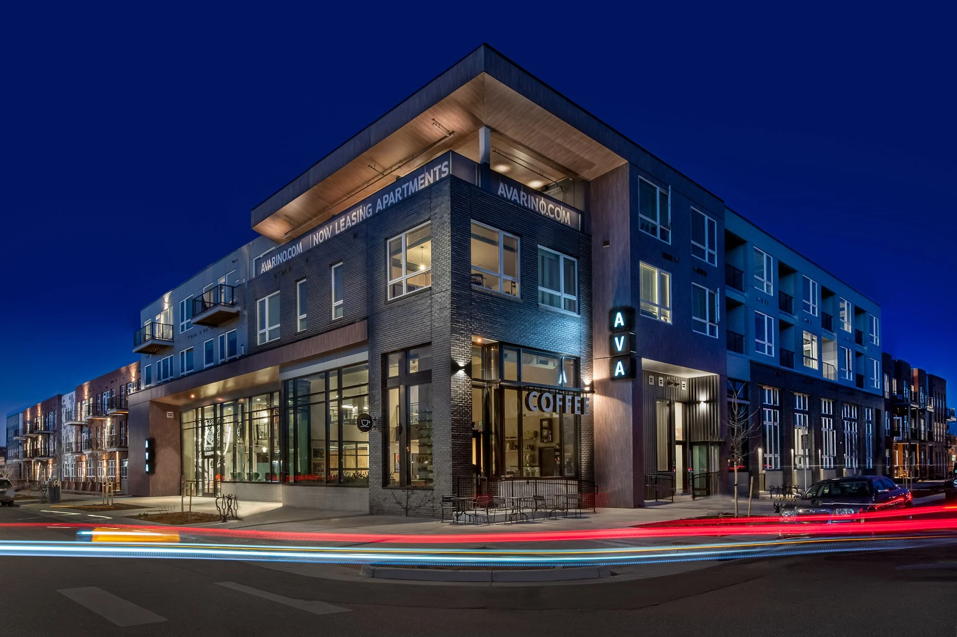 Dusk exterior of new apartment complex in RiNo Art District