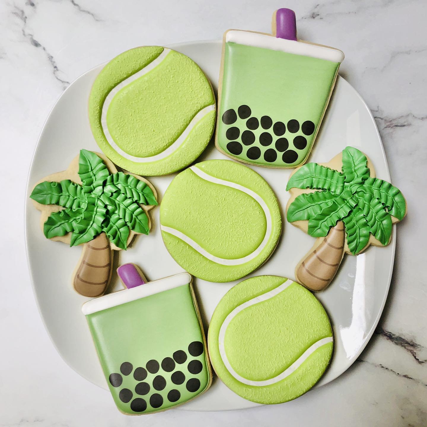 A favorites set to share for a birthday celebration! 🎉🧋🎾🌴
.
.
.
.
. 
#favorite #tenniscookies #tennis #bobacookies #boba #palmtreecookies #palmtrees #happybirthday #happybirthdaycookies #birthdaycookies #birthdaytreats #birthdaypartyfavors #party