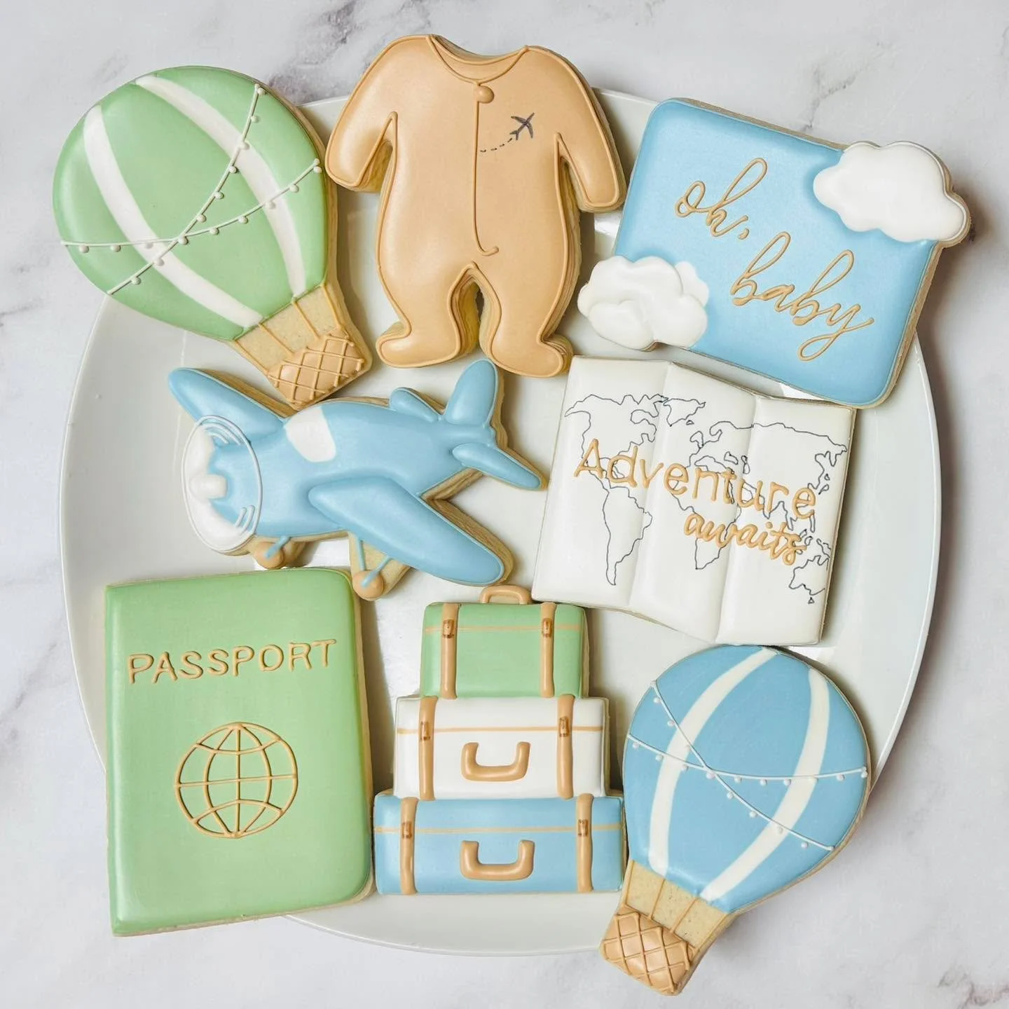 Cookies for a baby shower! 💙👶🏻
.
.
.
.
#ohbaby #itsaboy #travelcookies #adventureawaits #babyshowercookies #babyshowerfavors #babyshower #momsofinstagram #cookiefavors #royalicing #royalicingcookies #decoratedsugarcookies #customcookies #sugarart 