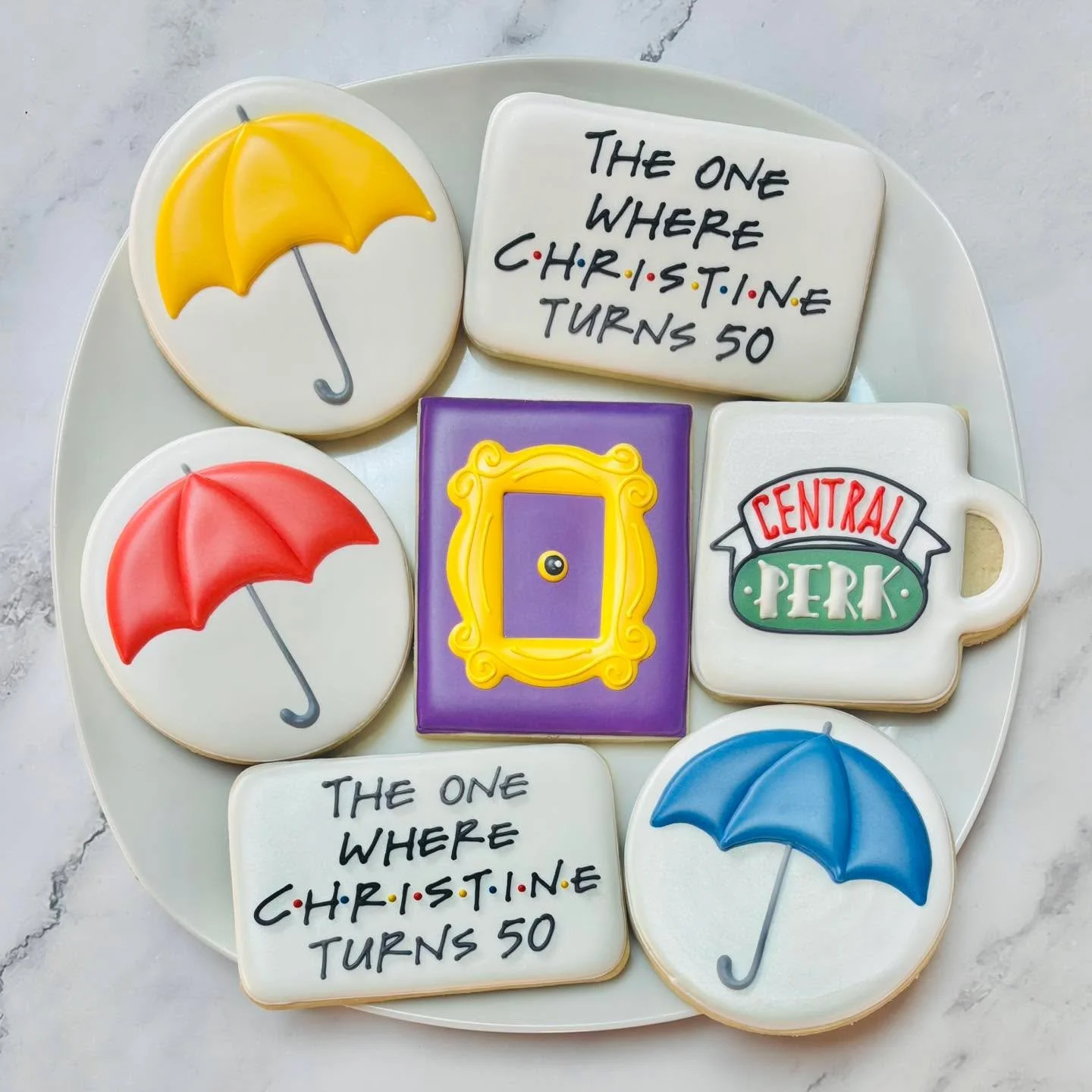 Friends-themed cookies for a birthday celebration! 🎉🚪☂️☕️
.
.
.
. 
#friends #friendscookies #thisis50 #thisisfifty#theonewhere  #happybirthday #happybirthdaycookies #birthdaycookies #birthdaytreats #birthdaypartyfavors #partyfavors #momsofinstagram