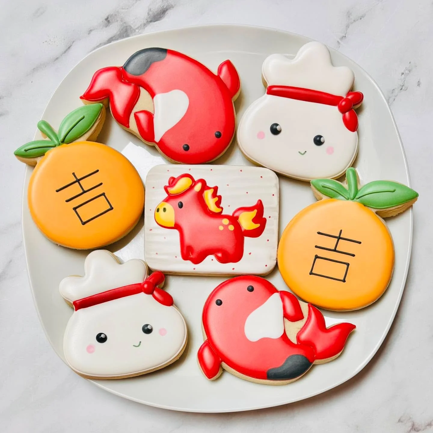 Cookies to celebrate the Year of the Fire Horse! 🎉🔥🐴🧧🍊
.
.
.
. 
#yearofthehorse #firehorse #新年快樂 #大吉大利 #chinesenewyear2026 #lunarnewyear  #royalicing #royalicingcookies #decoratedsugarcookies #customcookies #sugarart #sugarcraft #edibleart #cook