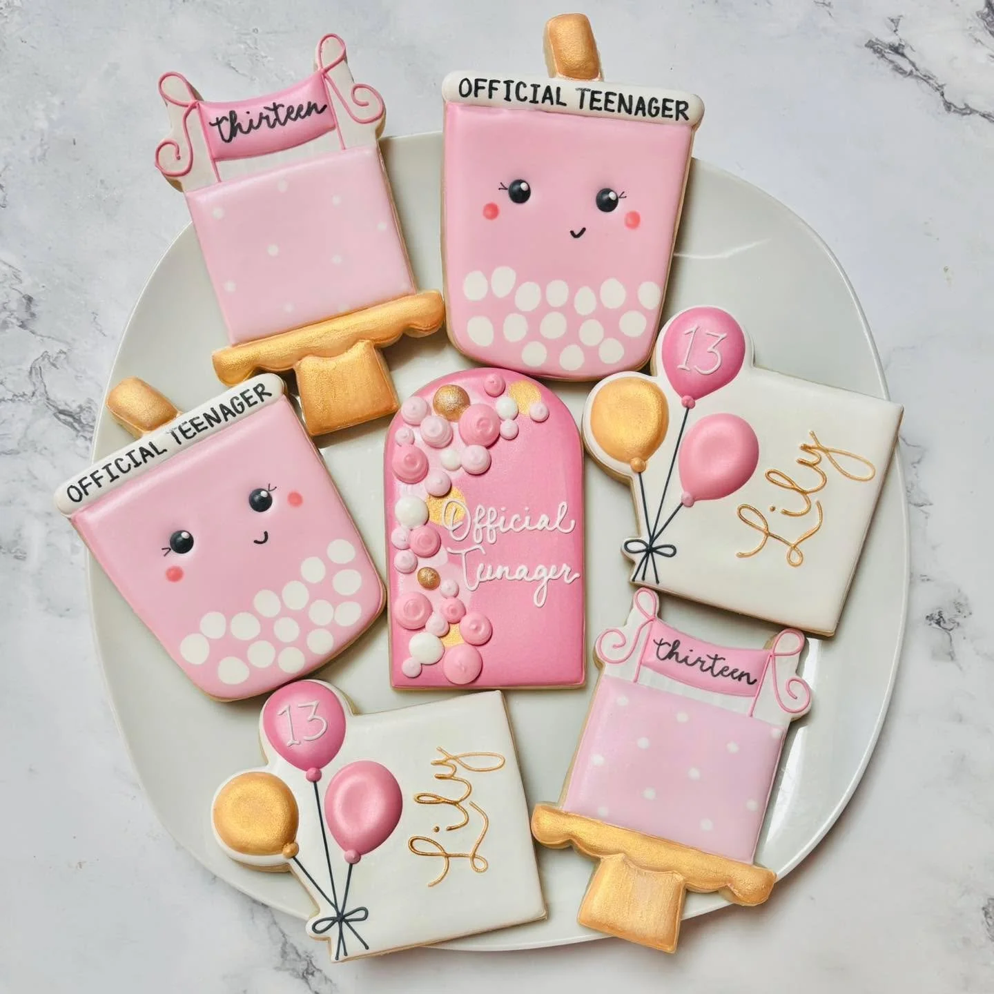 Cookies for a thirteen birthday celebration! 🎉
.
.
.
. 
#teenbirthday #thisis13 #pinkandgold #happybirthday #happybirthdaycookies #birthdaycookies #birthdaytreats #birthdaypartyfavors #partyfavors #momsofinstagram #cookiefavors #royalicing #royalici