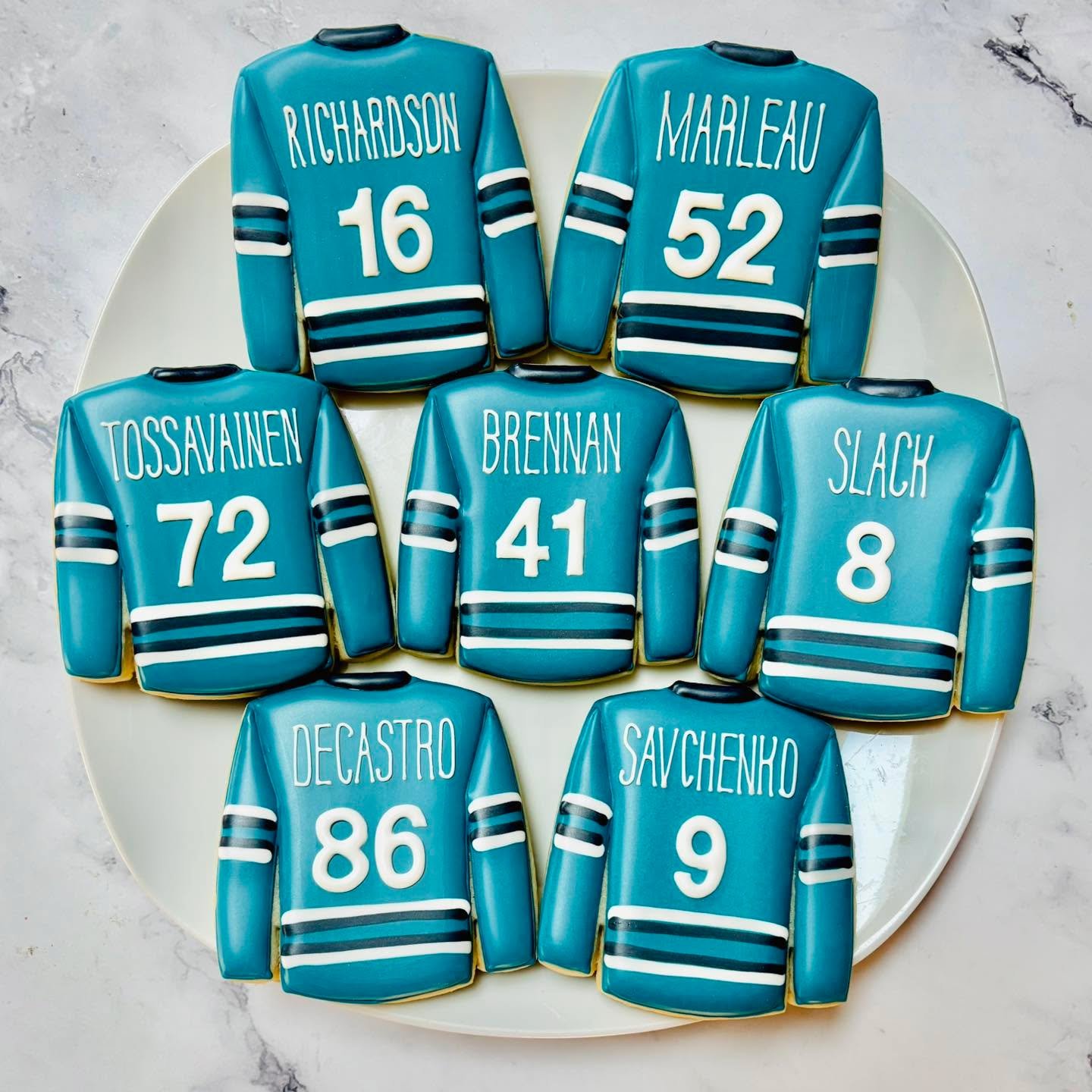Cookies for the San Jose Junior Sharks! 🎉🏒
.
.
.
. 
#hockeycookies #hockey #juniorsharks  #royalicing #royalicingcookies #jrsharkshockey #jrsharks #decoratedsugarcookies #customcookies #sugarart #sugarcraft #edibleart #cookieart #instabake #instasw