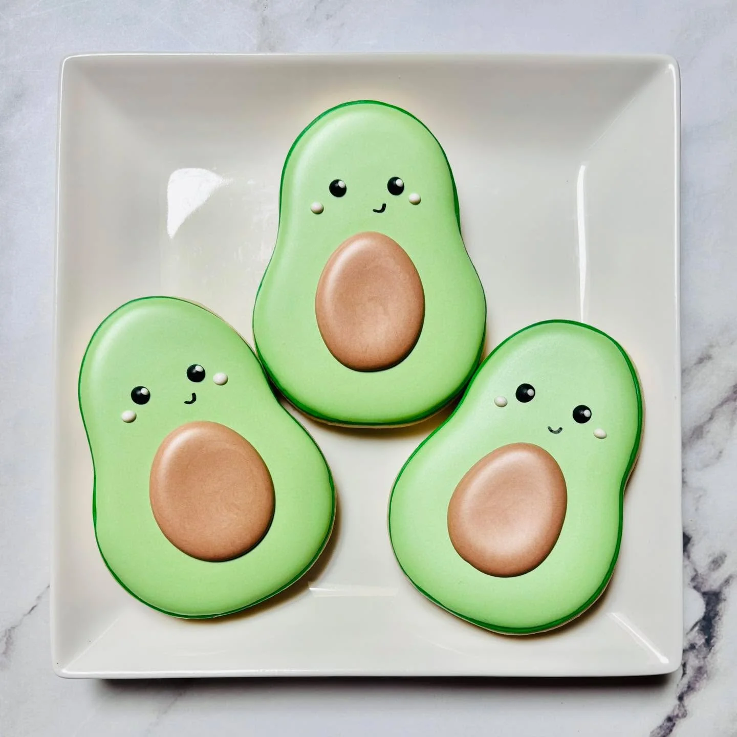 If you needed a reminder to enjoy avocados today, this is it! 💚🤎🥑
.
.
.
. 
#avocado #avocadolover #avocadolove #avocadotoast #cincodemayo  #royalicing #royalicingcookies #decoratedsugarcookies #customcookies #sugarart #sugarcraft #edibleart #cooki