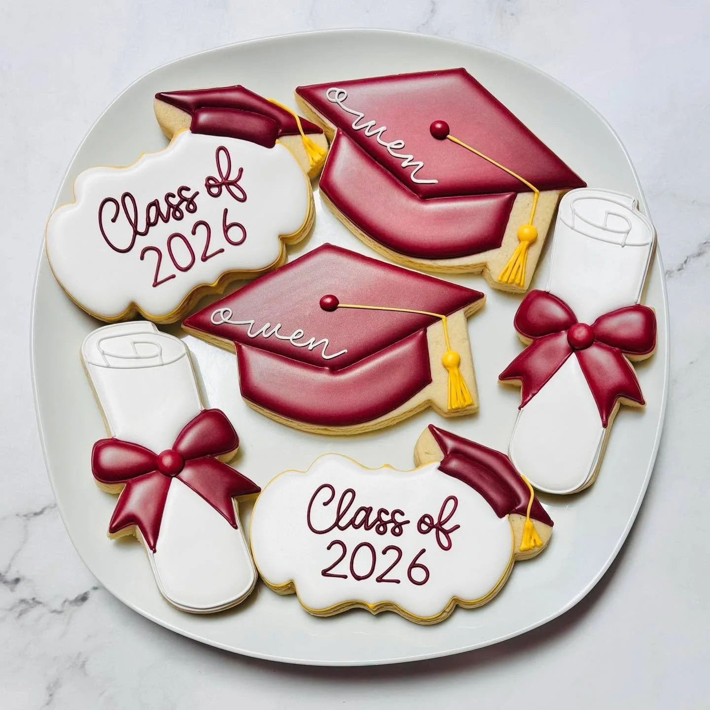 Class of 2026! 🎉
.
.
.
.
#graduationcookies #royalicing #classof2026 #royalicingcookies #cookiefavors #decoratedsugarcookies #customcookies #lovesweets #sugarart #sugarcraft #edibleart #cookieart #instabake #instasweet #sugarcookies #decoratedcookie