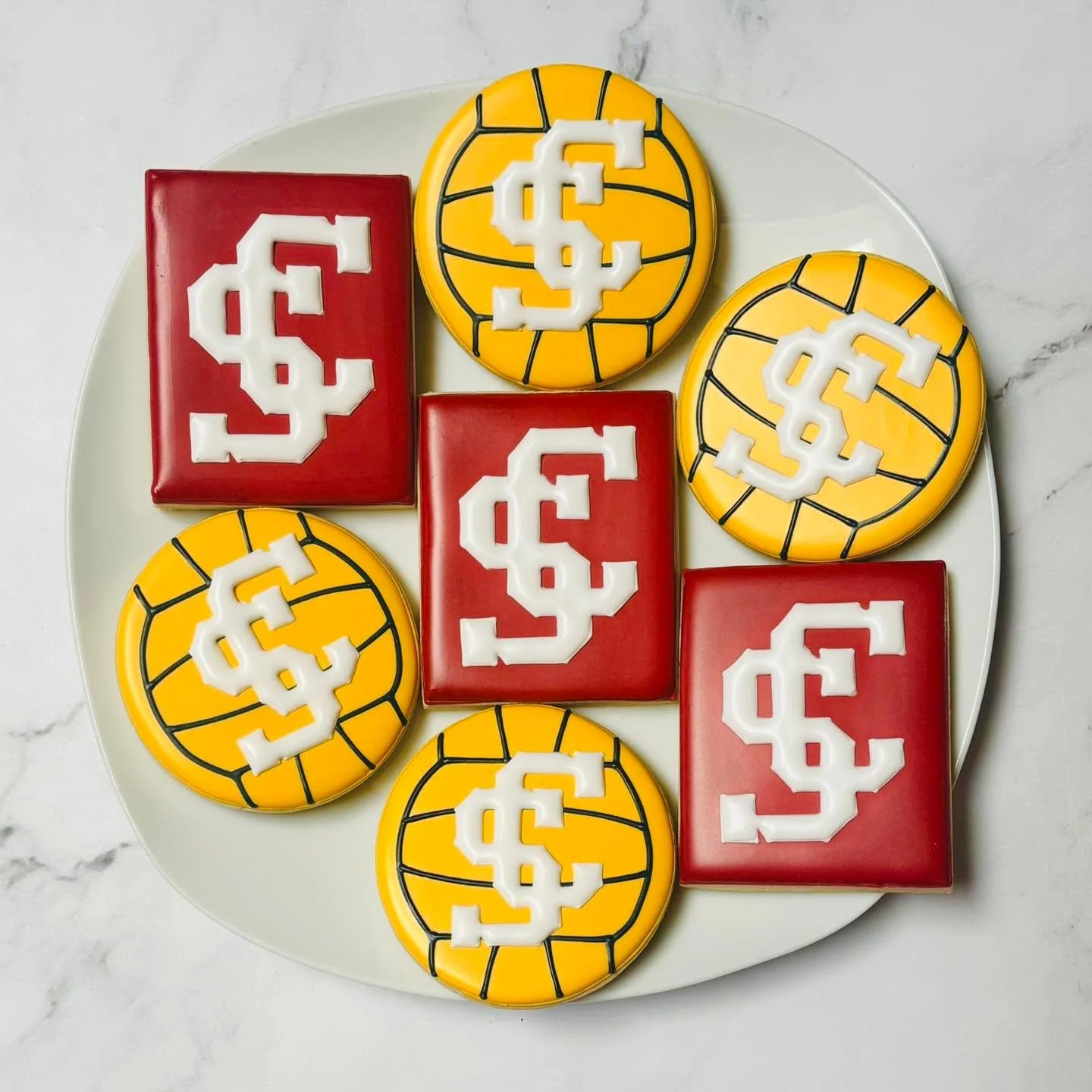 Cookies for a graduation celebration! 🎉
.
.
.
.
#graduationcookies #royalicing #santaclarauniversity #waterpolo #classof2026 #royalicingcookies #cookiefavors #decoratedsugarcookies #customcookies #lovesweets #sugarart #sugarcraft #edibleart #cookiea