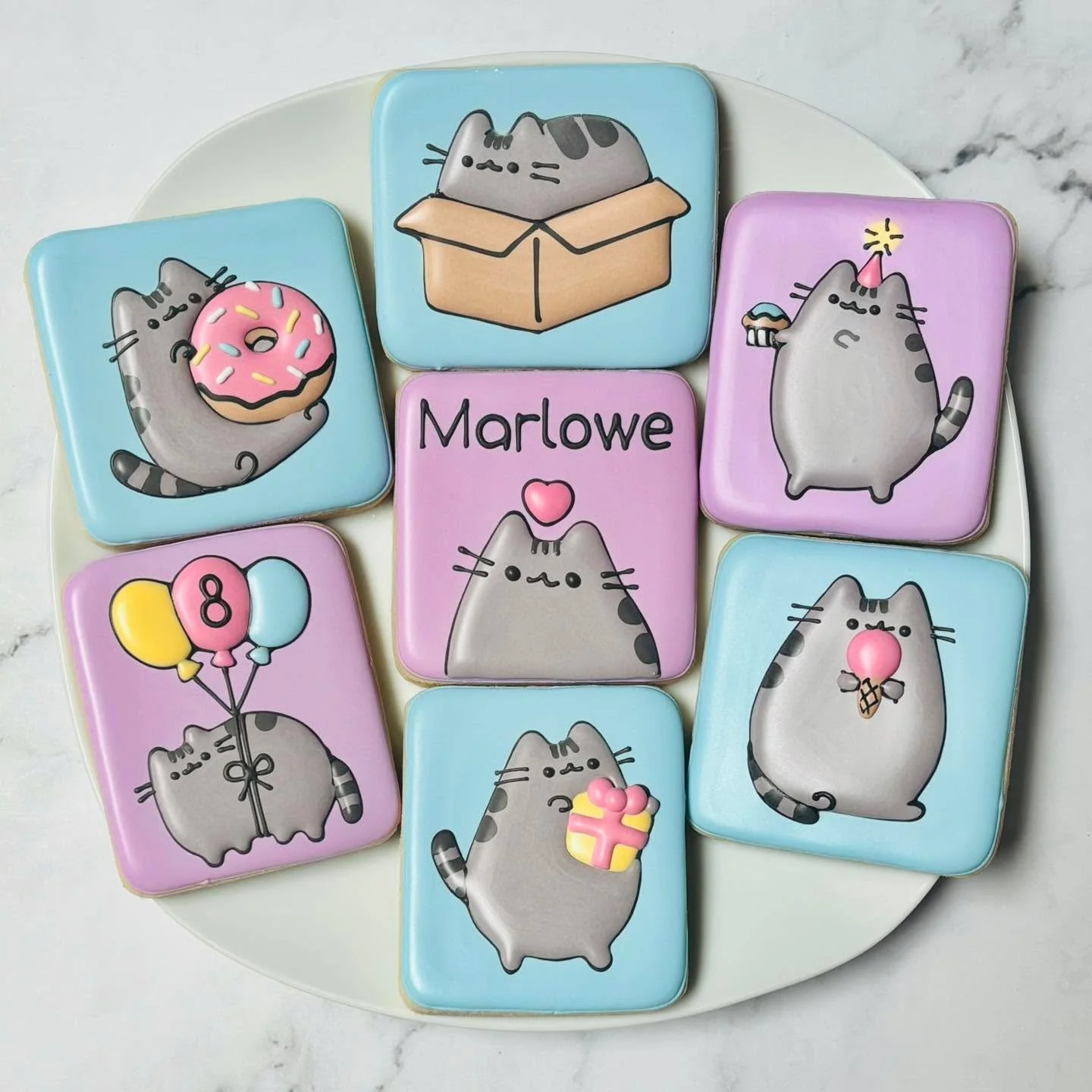 Pusheen cookies for a birthday celebration! 🎉
.
.
.
. 
#pusheen #pusheencookies #thisis8 #happybirthday #happybirthdaycookies #birthdaycookies #birthdaytreats #birthdaypartyfavors #partyfavors #momsofinstagram #cookiefavors #royalicing #royalicingco