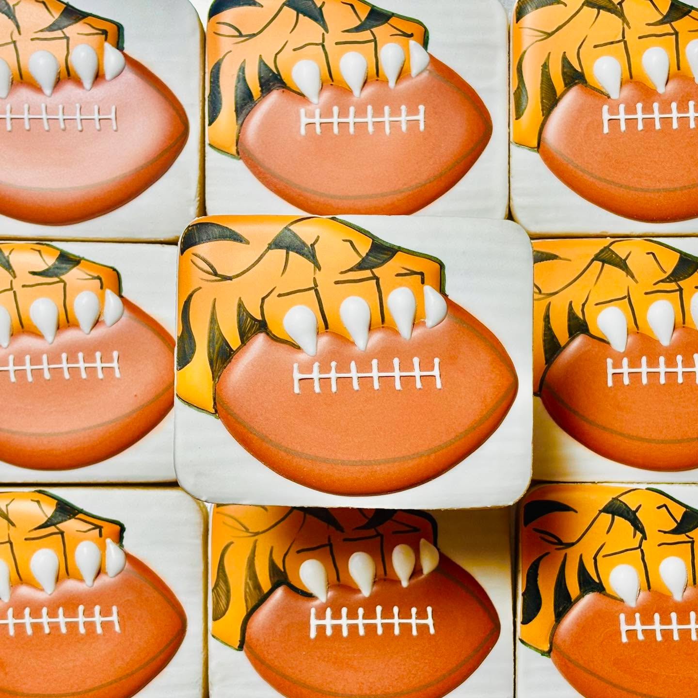 Cookies for a birthday celebration, when the theme is &ldquo;tiger football&rdquo;! 😆🎉🐯🏈
.
.
.
. 
#happybirthday #happybirthdaycookies #birthdaycookies #birthdaytreats #birthdaypartyfavors #partyfavors #momsofinstagram #cookiefavors #royalicing #