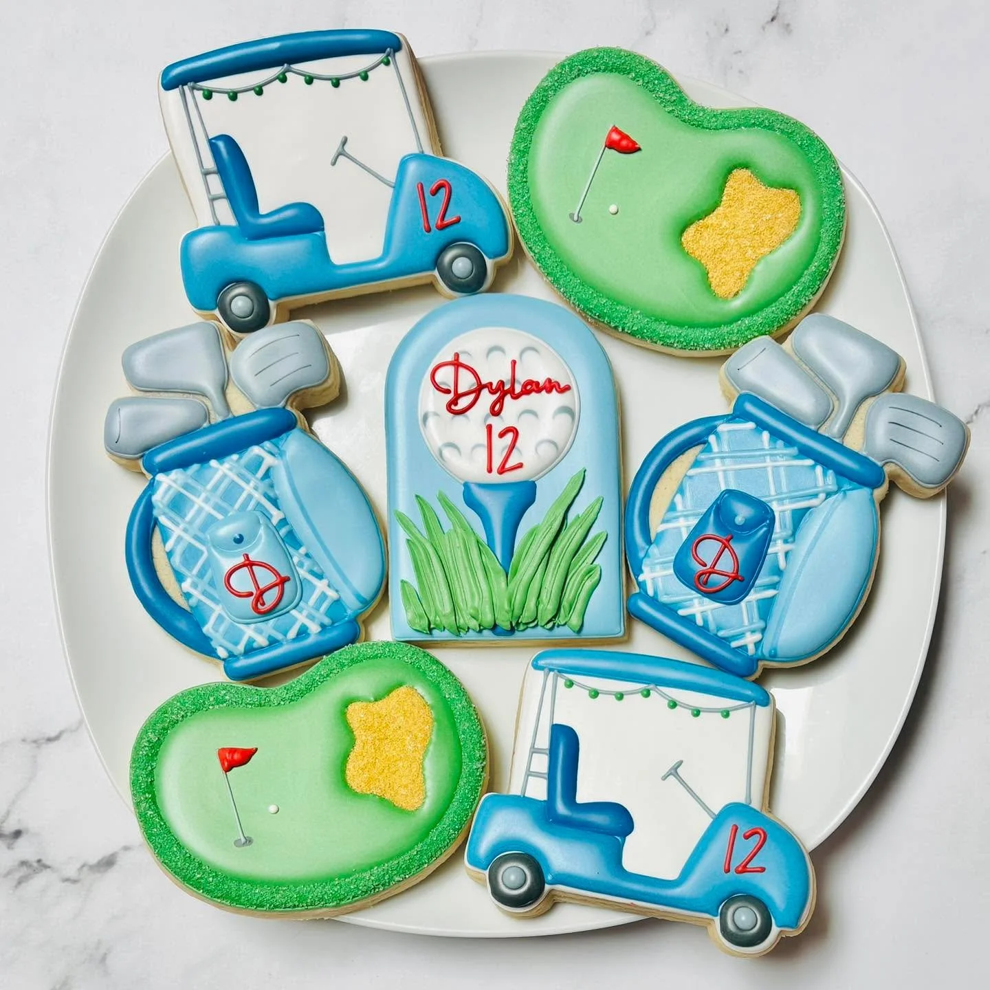 Golf cookies for a birthday celebration! 🎉⛳️🏌🏻
.
.
.
. 
#golfcookies #golfing #golfer #thisis12 #happybirthday #happybirthdaycookies #birthdaycookies #birthdaytreats #birthdaypartyfavors #partyfavors #momsofinstagram #cookiefavors #royalicing #roy