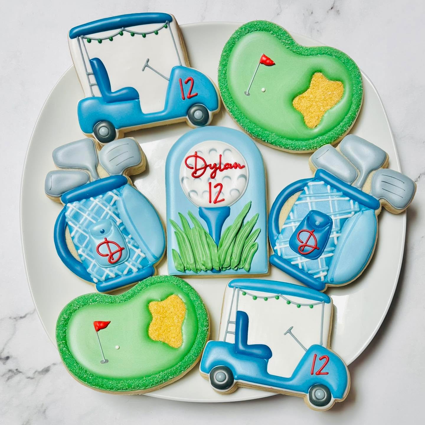 Golf cookies for a birthday celebration! 🎉⛳️🏌🏻
.
.
.
. 
#golfcookies #golfing #golfer #thisis12 #happybirthday #happybirthdaycookies #birthdaycookies #birthdaytreats #birthdaypartyfavors #partyfavors #momsofinstagram #cookiefavors #royalicing #roy