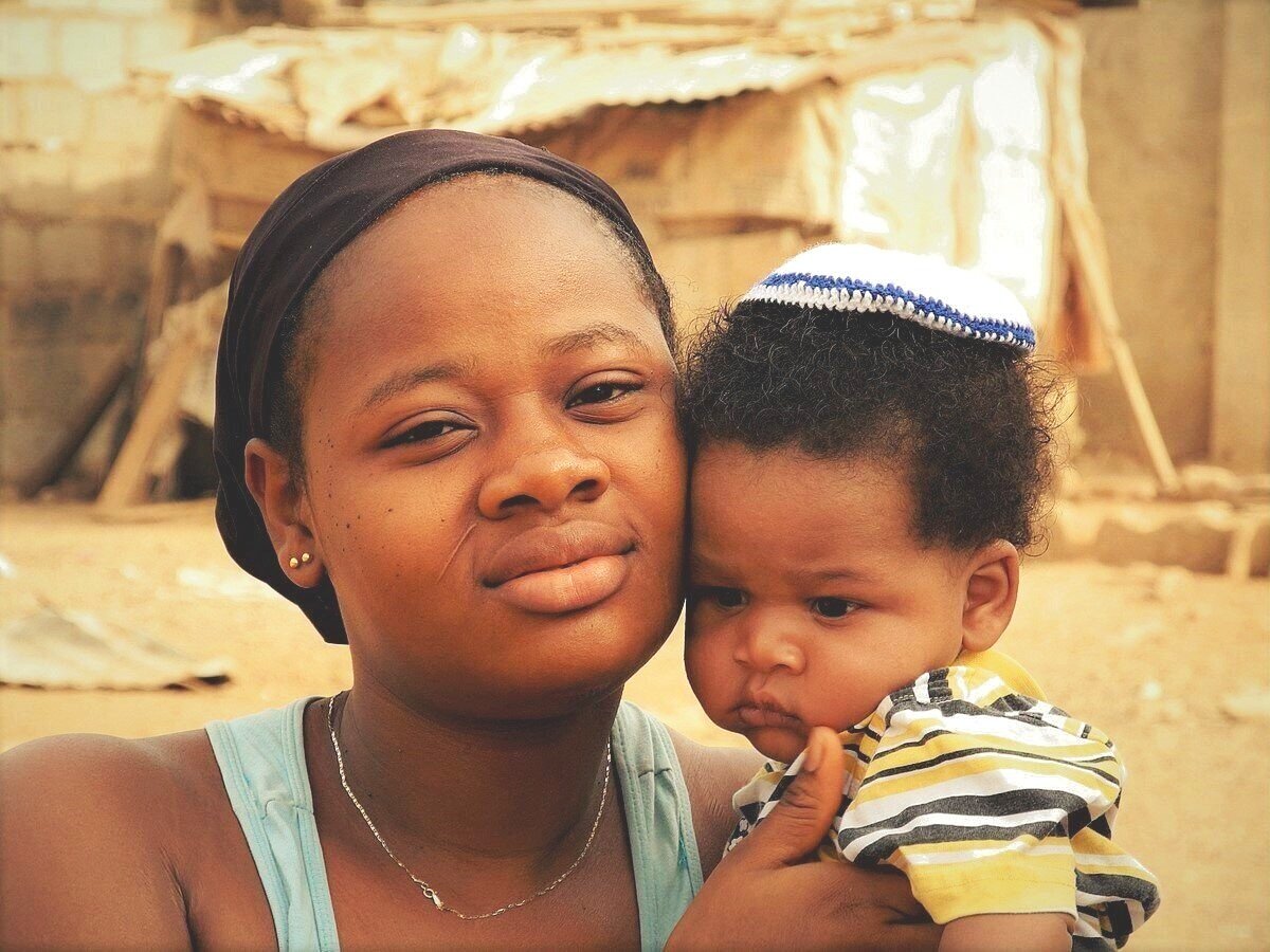 Onyeka Ibeh and her baby, Yishai, in Abuja, Nigeria. Photo — Shai Afsai