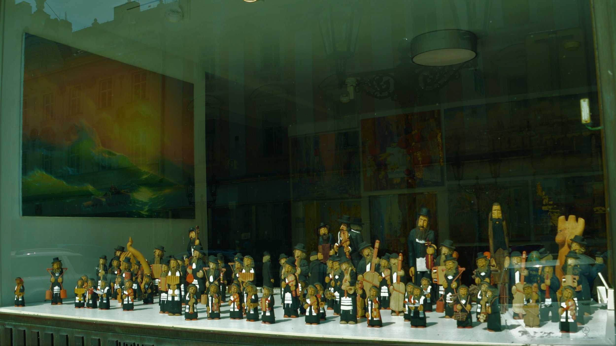 Figurines of Jews on display at an art shop in Prague. Photo — Shai Afsai