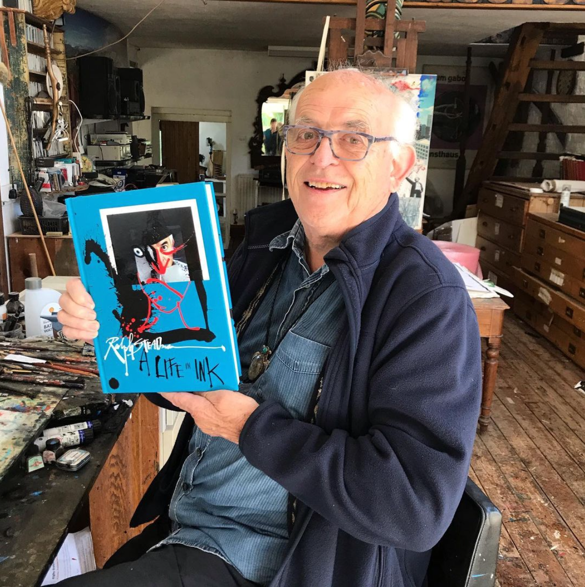 ralph holding book.png