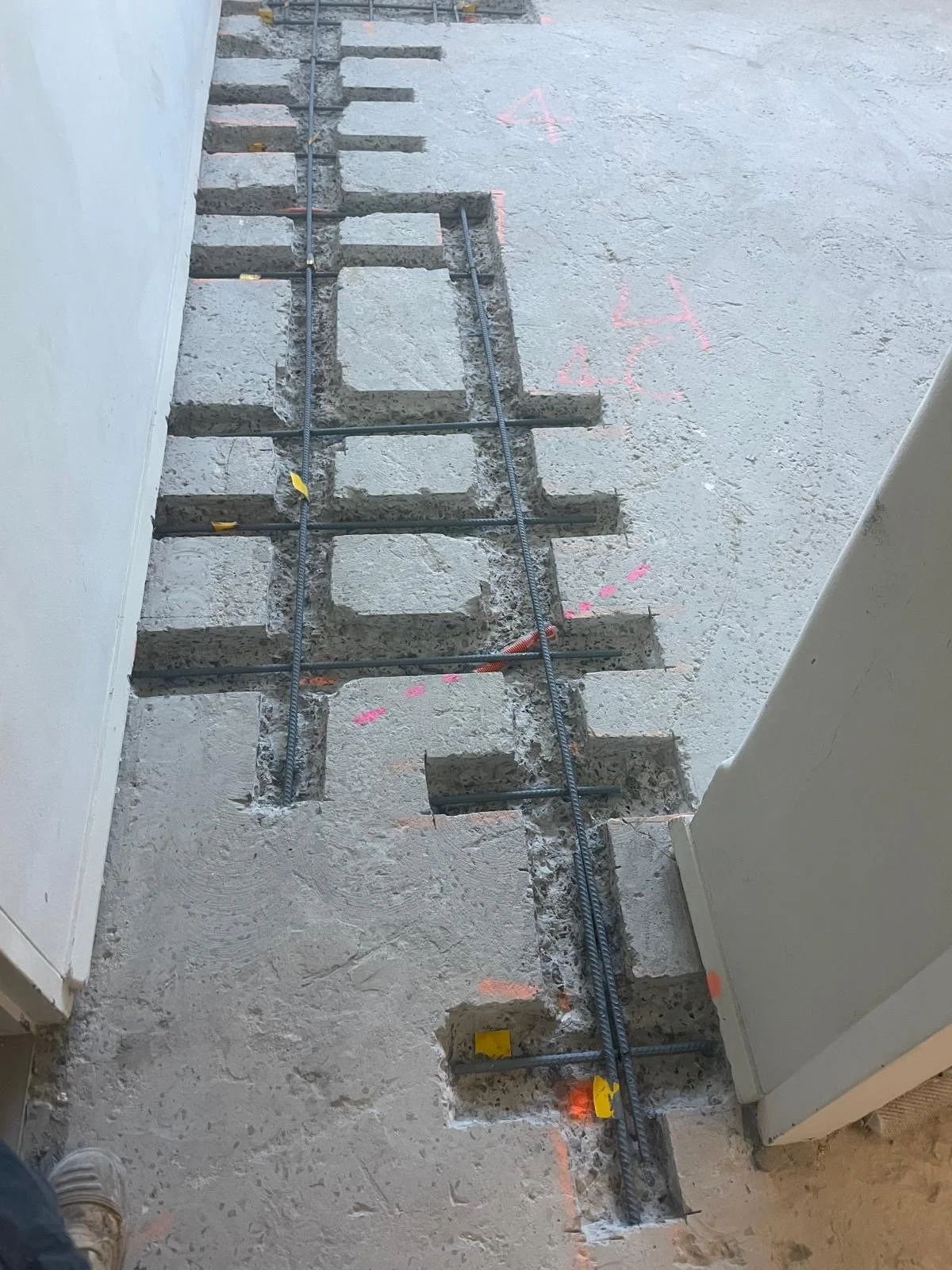 Concrete slab strengthening