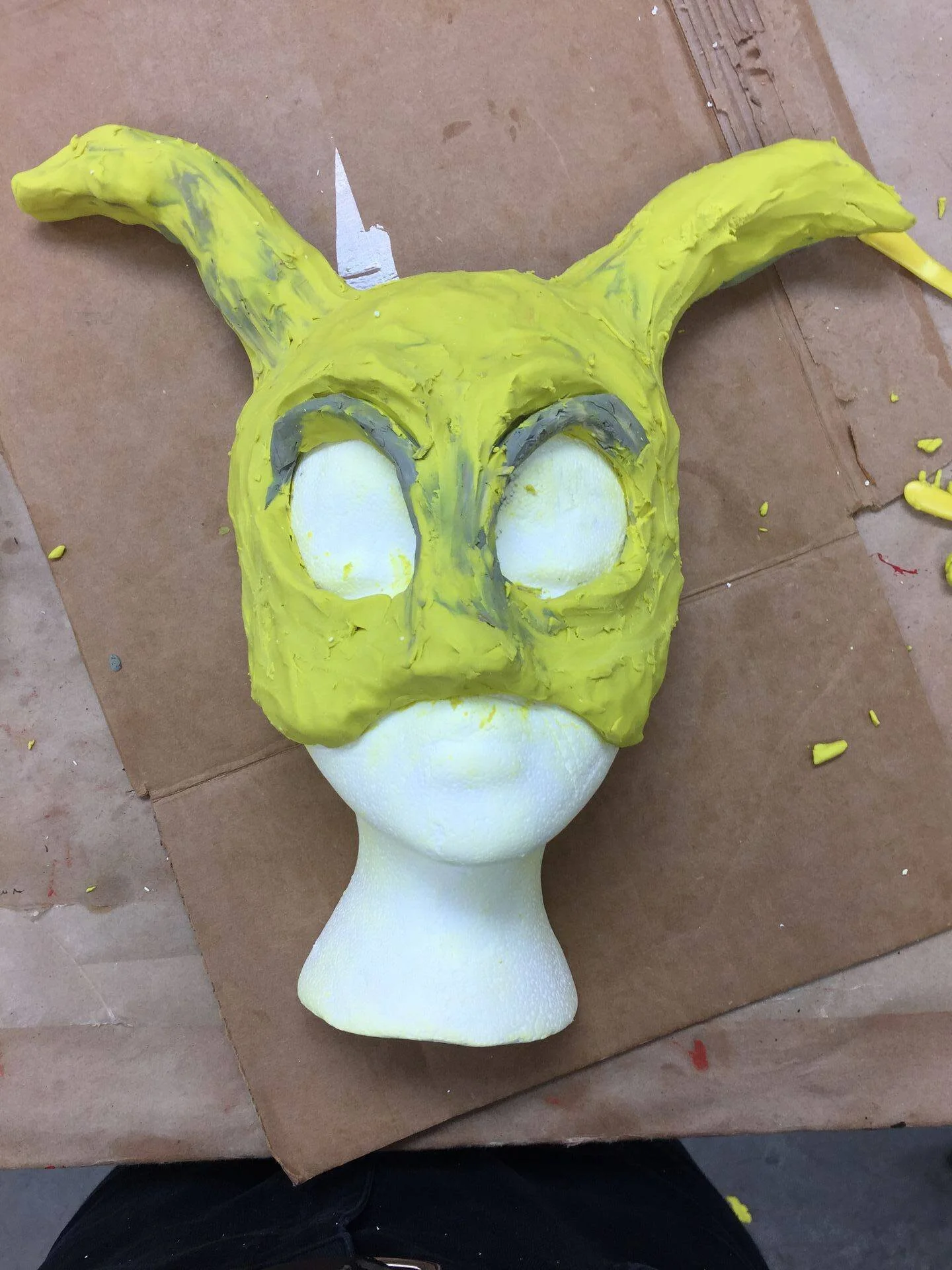 Step 2: Forming the Mask on a styrofoam head with oil-based clay.