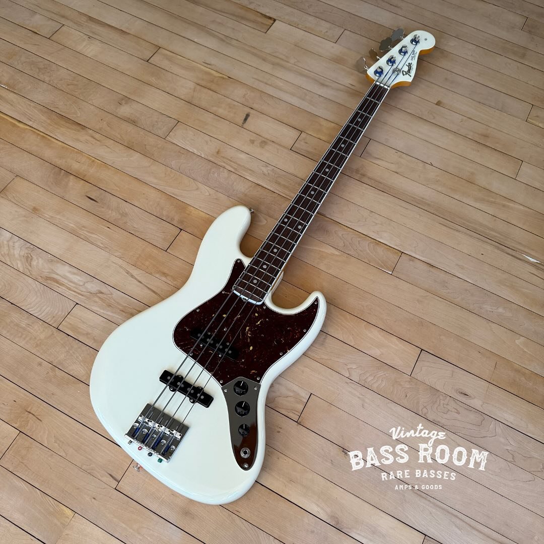 A stunning &lsquo;66 AVRI Fender Jazz Bass in the best colour in my opinion, Olympic white with matching headstock. The tuners have been replaced with reverse wound GOTOH tuners and the bridge with a BADASS II, the originals including the fender pack