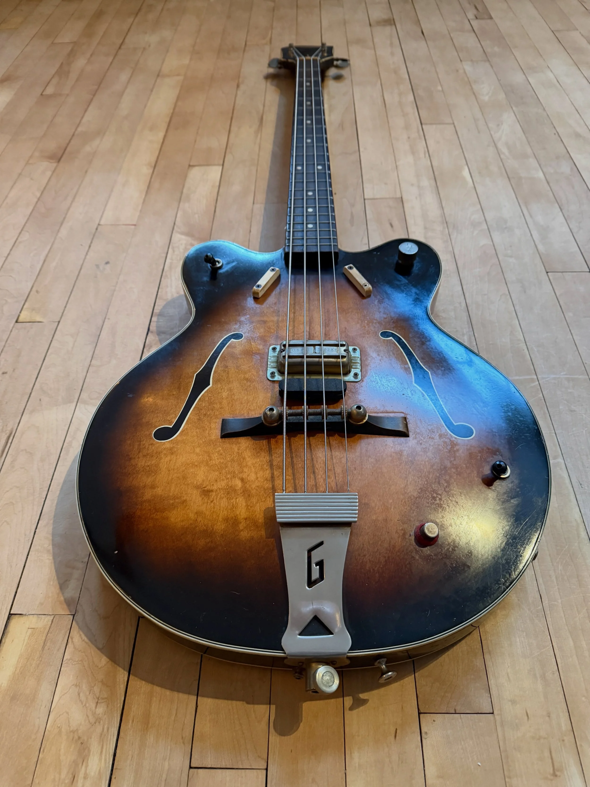 1963 Gretsch 6070 Country Gentleman bass dark burst was one of the magnificent basses scooped up very recently. 

The Gretsch 6070 Country Gent Bass has a Maple Top, Maple Body, Deep C Profile Maple Neck, Rosewood Fingerboard, Original Tuners, Roller