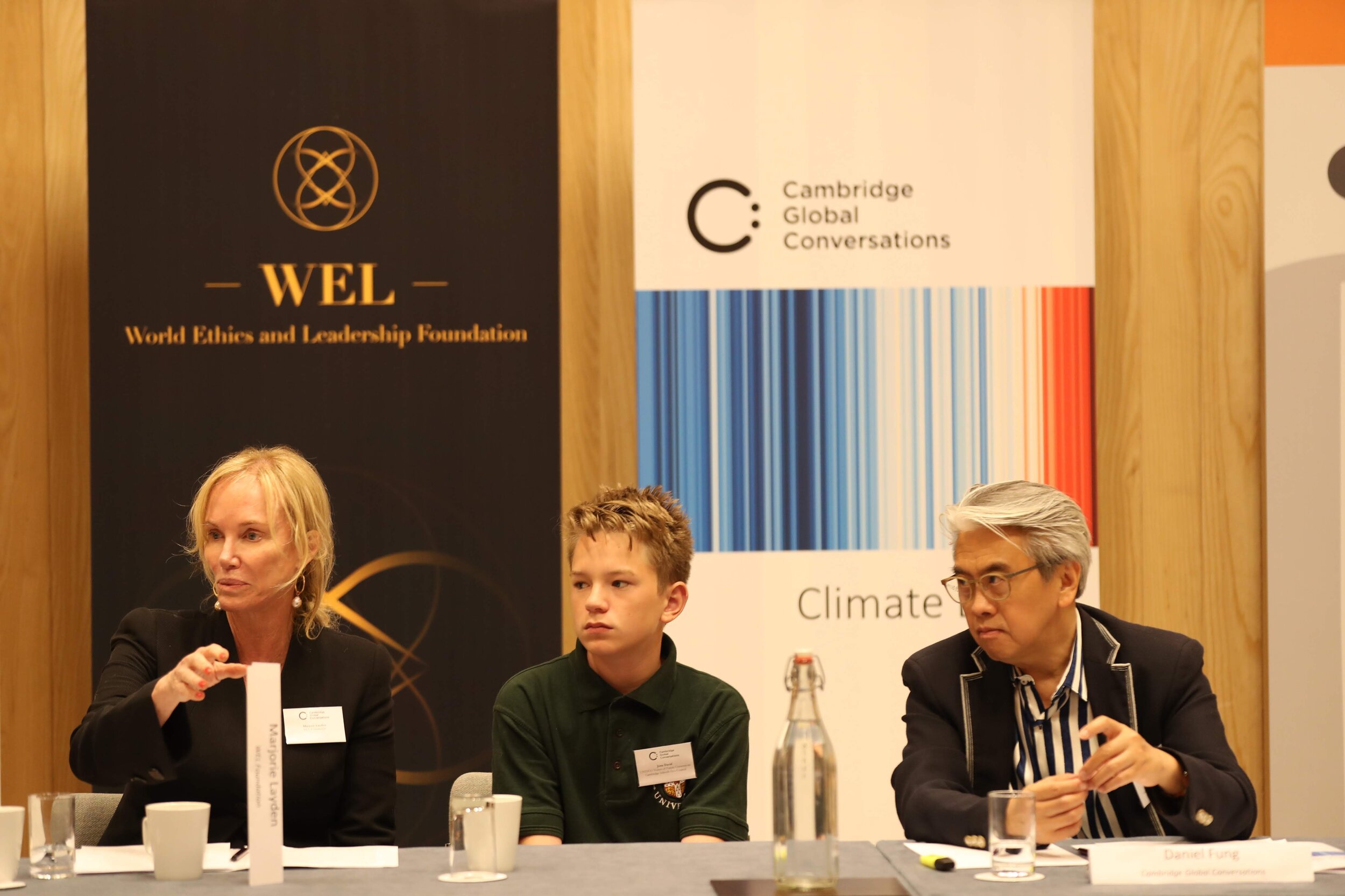   WEL Foundation’s    Marjorie Layden    at CGC: Climate Ethics. Next to her is youth climate strike leader    Jona David   , and CGC Founding Chair    Daniel Fung   .  