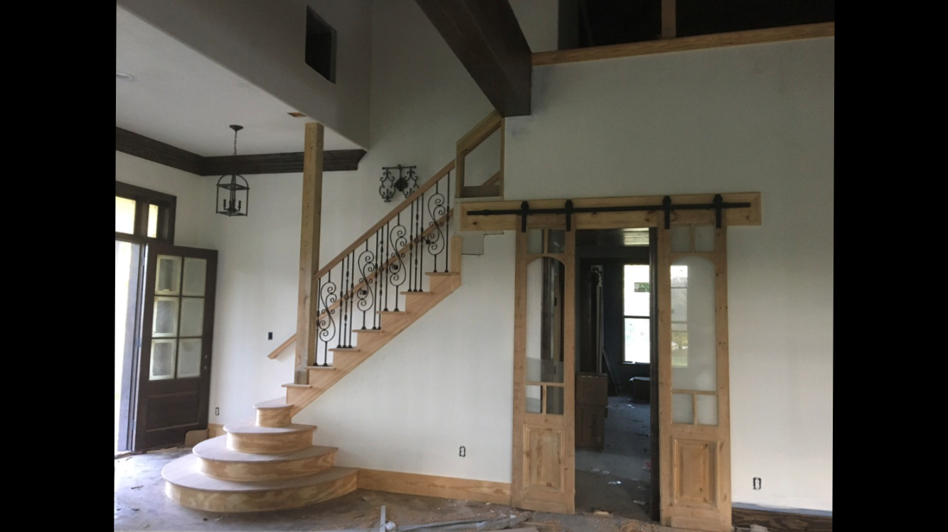 Custom stairs and barn door.png