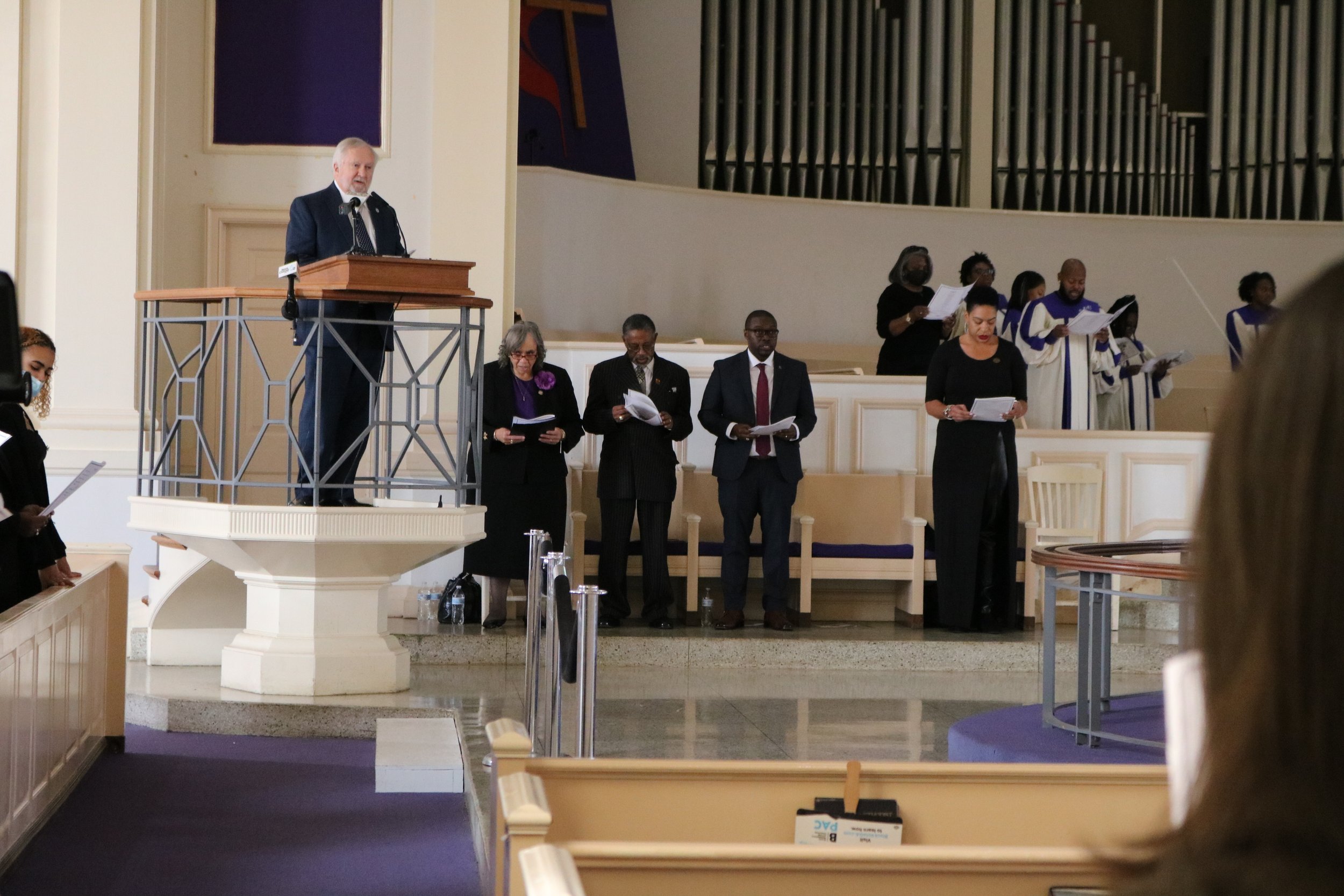  President Brooks Keel reads a passage from the program at the Tri-College Martin Luther King Jr. celebration on Jan. 13. 