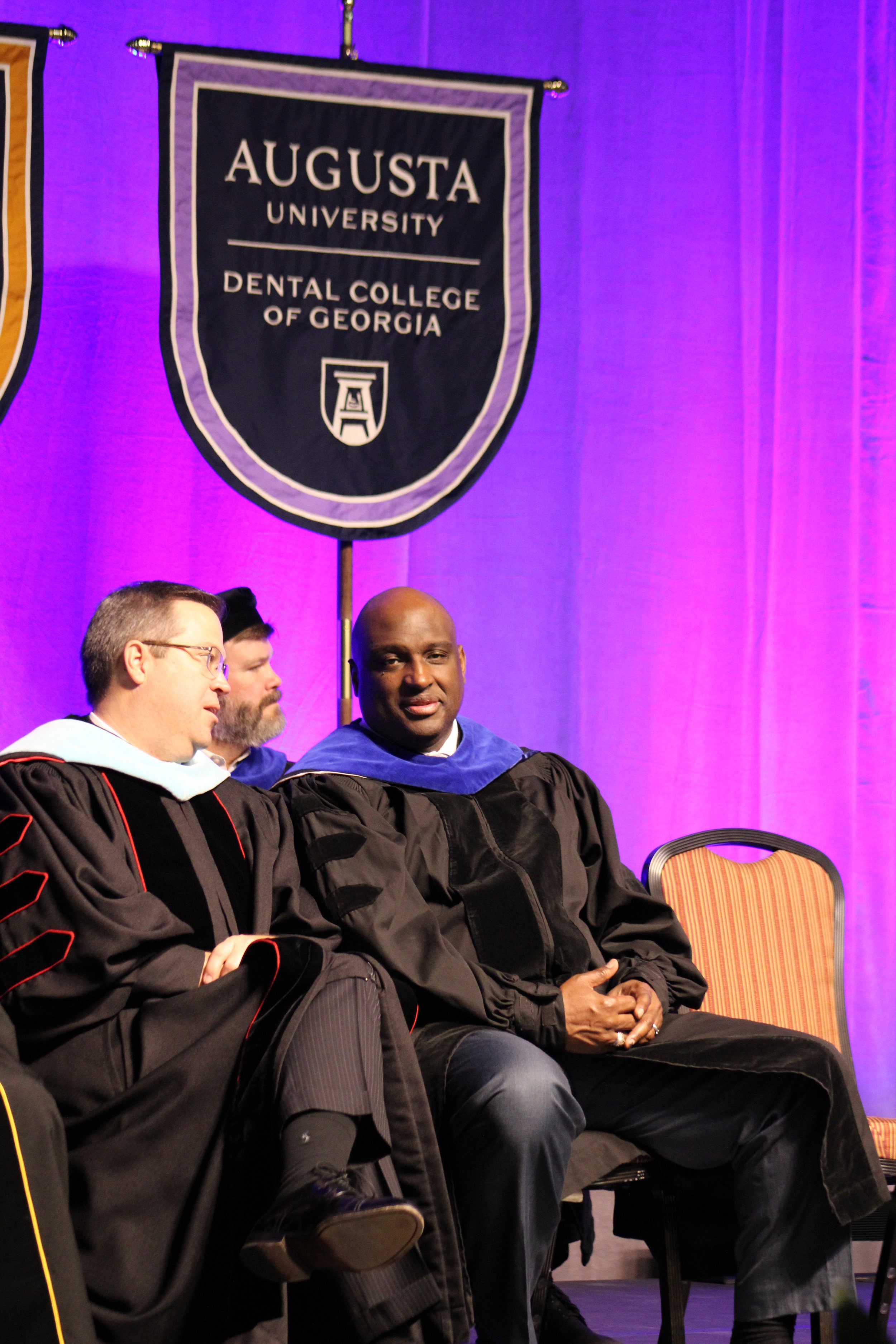  Executive Vice President Russell Keen (left) and keynote speaker Rodney Bullard (right) at commencement on Dec. 14.  (photo by Rakiyah Lenon)  