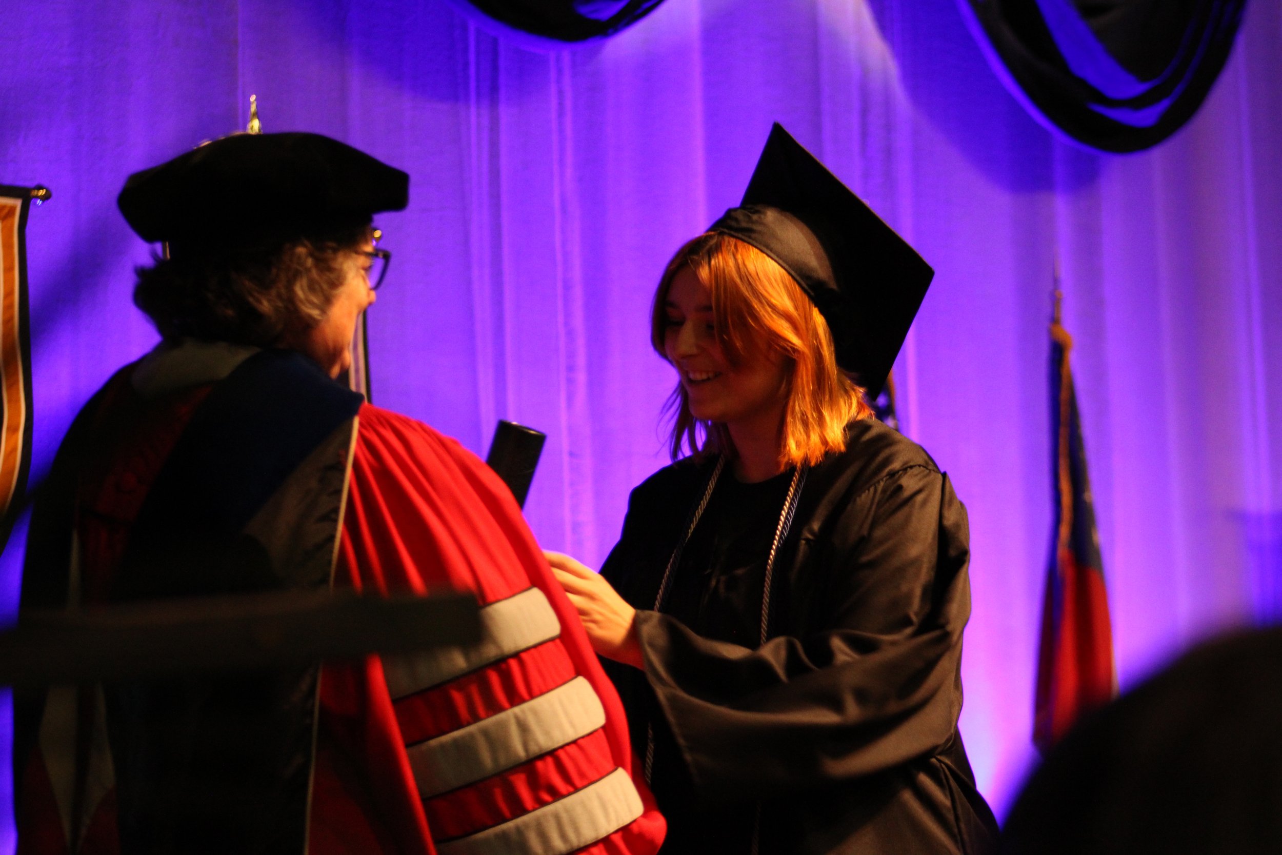  First student to receive a degree in Digital and Visual Storytelling Grace Rolfe.  (photo by Rakiyah Lenon)  
