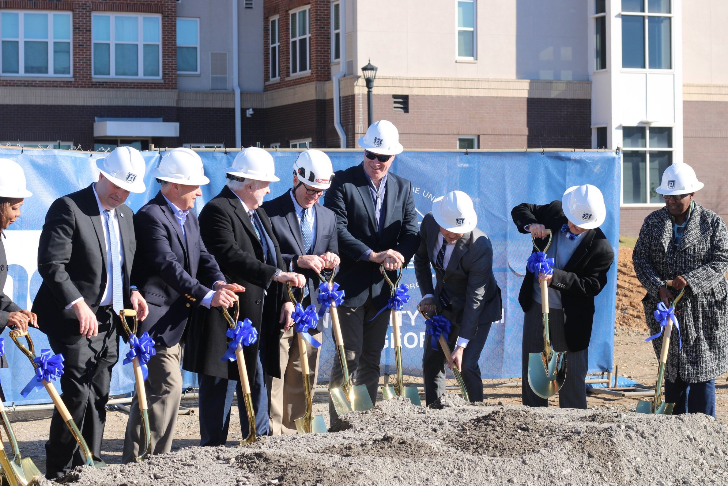  AU community in breaks ground for the new parking deck. 