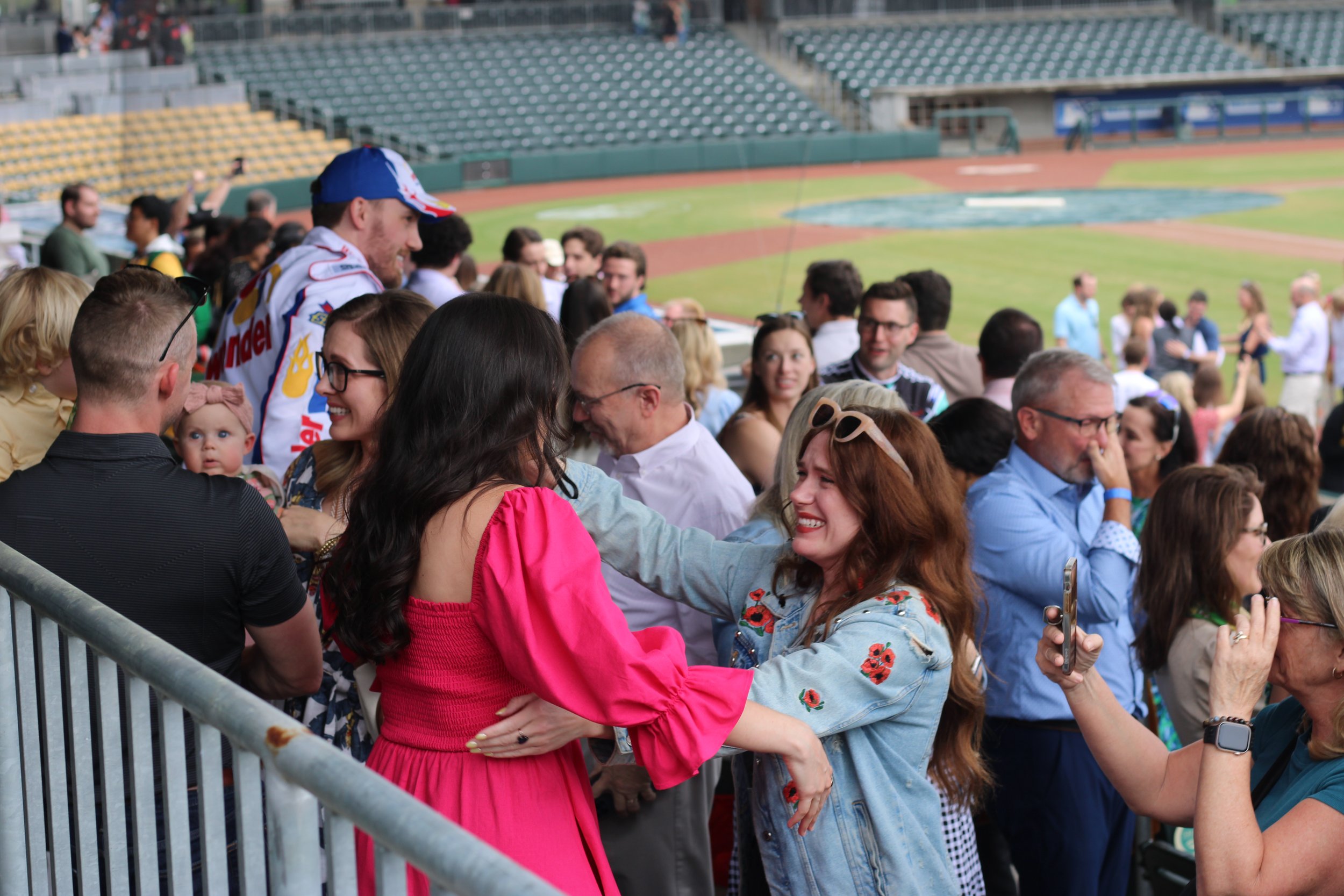  Family and friends embrace each other at MCG’s Match Day on March 15. 