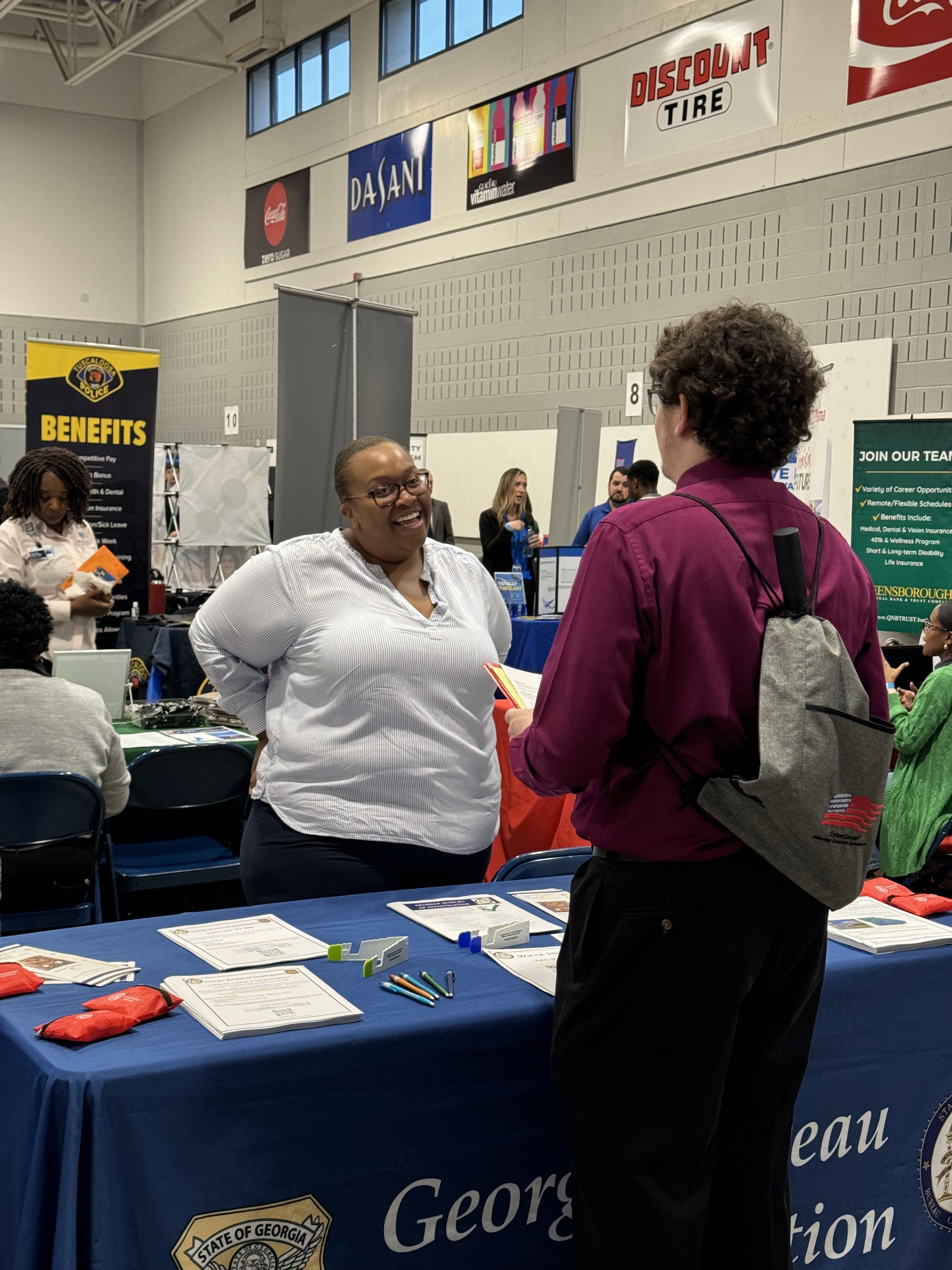  A student speaking to a Georgia Bureau of Investigation employee. 