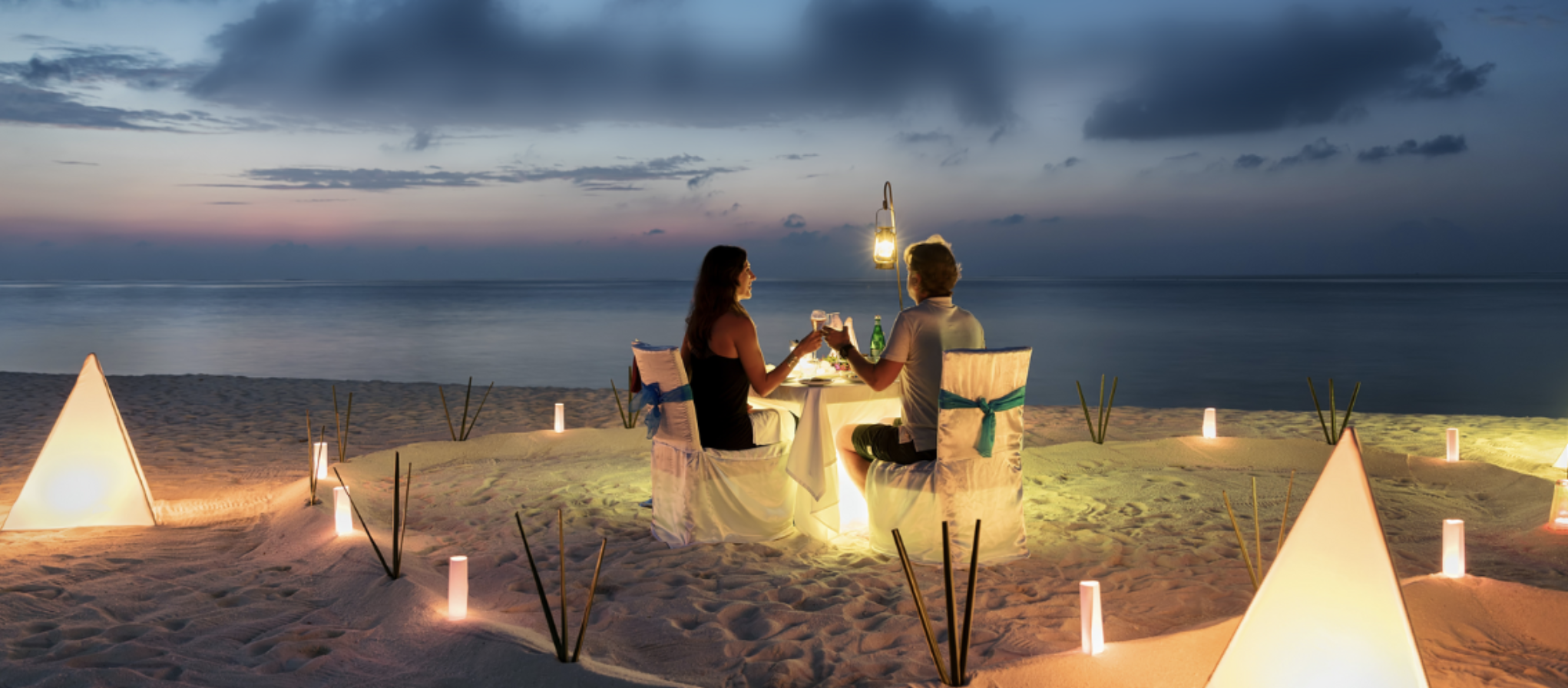 Couple Beach Candlelit Dinner Stock Image - February 21, 2024.png