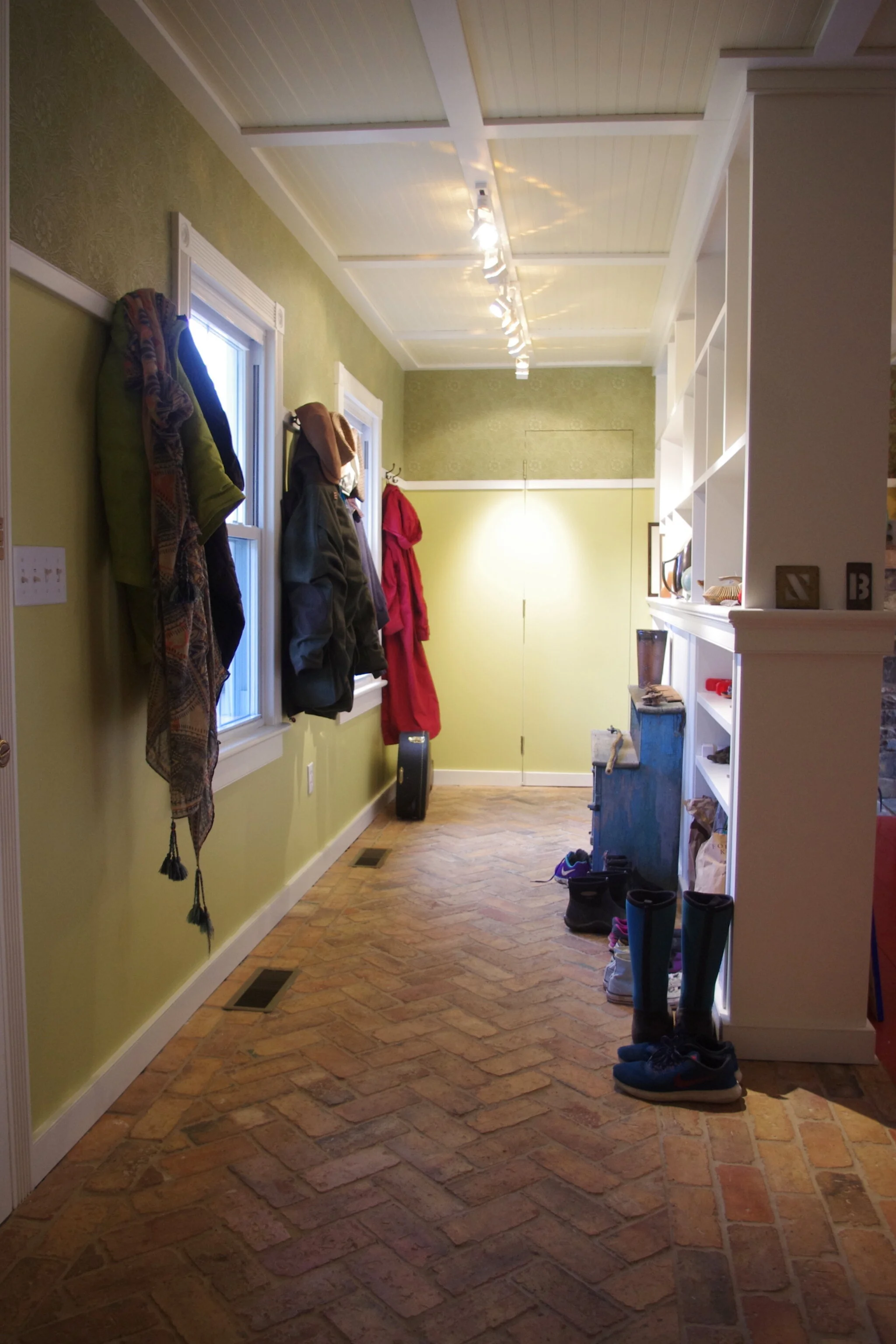 Relocate door to garage and create a mud room