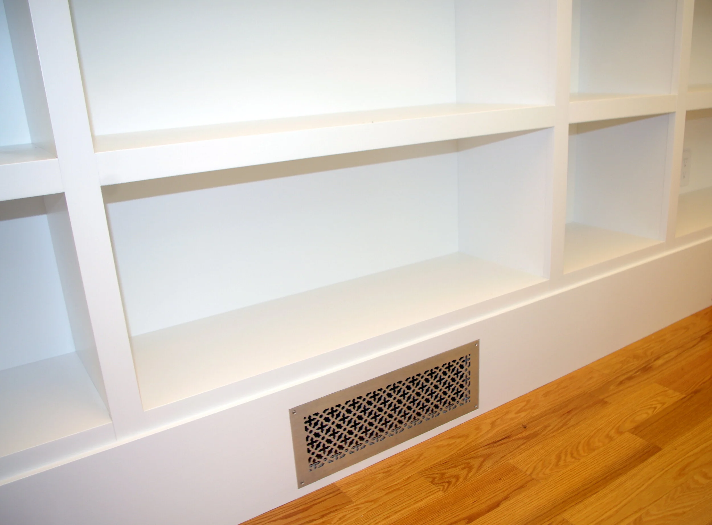 Built-in Bookcases integrated with HVAC registers