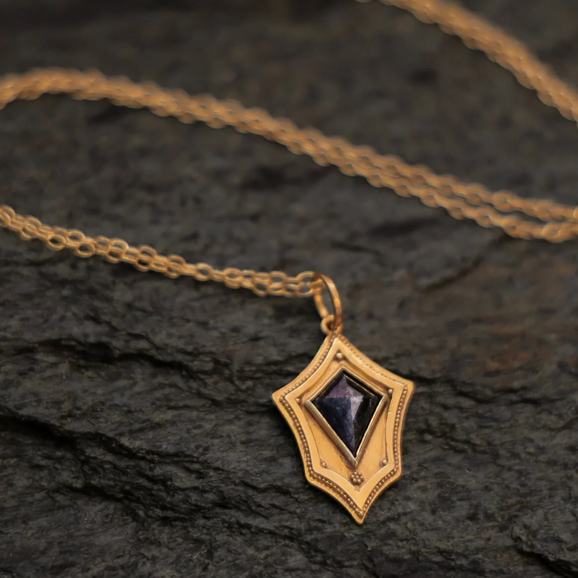 The shield symbolizes strength, bravery, and the willingness to face challenges head-on. Diamonds amplify energy and attract abundance. This Diamond and 18k gold talisman shield was created to attract positive energies, boost confidence and enhance t