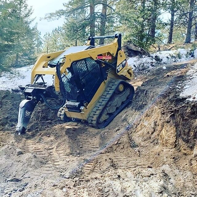 @michael62491 demonstrates the advantages of going up a steep slope backward with a loader. 
@josh_cordaro pulling stumps in Boulder County for this residential access driveway. 
#earthmoving #earthmovers #excavating #dirtwork #miniexcavator #landdev
